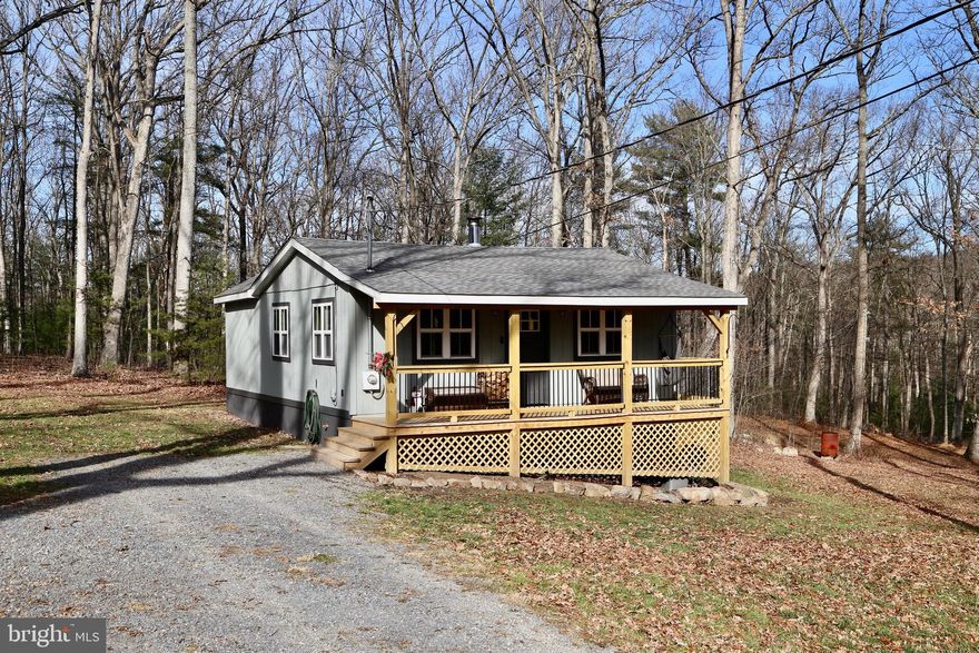 Step into this charming 2-bedroom, 1-bathroom home nestled on 2.23 acres. Completely renovated in 2021. New roof, windows, well pressure tank, new flooring, the list goes on and on! Large bathroom with a walk-in shower. Numerous outbuildings, including a stable-barn with a fenced-in area currently housing chickens. 35 minutes to Winchester, VA, 20 minutes to Capon Bridge for local Cafes, Restaurant and Shopping. Less than 2 hours to Washington, DC. Schedule your showing today!