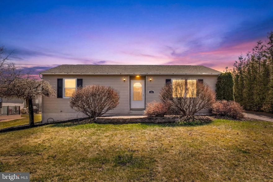 This beautiful ranch home in Lake Meade offers comfortable living in a sought-after private gated community. Featuring two bedrooms on the main level and an additional spacious bedroom on the lower finished level, the layout is ideal for families or guests. The lower level also includes convenient laundry room and workshop area and a fully finished recreational room, perfect for entertaining or relaxing.
The property sits on a level, landscaped lot that backs up to open farmland, providing scenic views and extra privacy. Enjoy the charm of an English garden and a concrete patio at the rear of the home, leading to a great private backyard. A firepit area invites you to gather for s'mores and outdoor enjoyment year-round.  This home has been used a seasonal home for the current owners and is in excellent condition!  
Lake Meade offers many amenities for community members, including a private 300-acre lake that is great for water skiing, kayaking, canoeing, sail boats, pontoons, and fishing!  Included all with your yearly dues!   10 recreational areas that offer a variety of activities including volleyball courts, basketball, tot lot play areas, picnic table and storage for your kayaks conveniently located by the water.   Boat slips are available, opening on March 1st every year to allow you a place for your boat on the water!  There are many clubs and organizations for everyone to find what they are looking for.    Outdoor pool offers lap lanes, diving boards, a water slide and a mushroom water feature for the little ones.  Tennis & pickleball courts are located next door to the pool.   Don’t miss out of this great well maintained ranch home in Lake Meade!