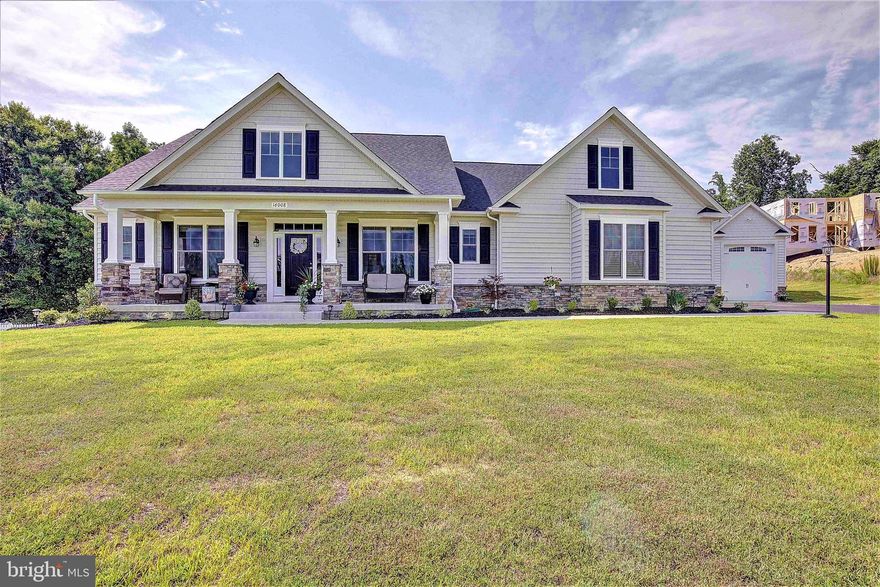 STUNNING HOME and it is only 1.5 years young and it could be yours!!!  These folks built their forever home then are needing to relocate so now is your opportunity to get a newer home with all of the bells and whistles without the wait.  So many features to mention for this beautiful Amberleigh II model from Wilkerson builders. Wilkerson has been a well desired builder in Southern Maryland for years and years. The quality is superb and the craftmanship is above the rest.  Featuring in this beauty are many many upgrades. To built this home today it would we well over 875,000. From the moment you pull into the driveway you will fall in love with the second garage/detached with 2 bays, one large enough for your truck or SUV and the second bay designed for a large boat or camper. The upper level offers a semi finished space great for storage or anything else you may think of.  This garage is fully insulated, drywalled walls, extra windows for natural lighting, upgraded large door opener for the larger door, exterior lighting.  This is not your standard detached garage. Quoted to built this today would be over 125k.  Let's take a look at the home and all of its extra upgrades making this one stand out in the crowd. From the moment you step inside you will fall in love with the open floor plan and everyone LOVES the split bedroom plan as well.  The coffered ceilings in the family room and kitchen we a definite upgrade and really making this space grand.  Relax by the wood burning fireplace on cold winter days or relax on your 16ft screed in porch all summer long.  This porch is not only screened it is composite so it will last you a lifetime.  Chill with a cup of joe or a glass of wine overlooking your private fully fenced backyard. This yard backs to the trees and will not be developed. The owners have even permitted the back yard for a swimming pool, you just need to add it they have done the rest! The kitchen is stunning offering upgraded Café brand appliances in the slate stainless steel finish. Farm sink, 2 ovens, and beautiful granite counters and lovely backsplash.  Plenty of cabinet space here and nicely designed kitchen perfect for everyday or entertaining.  The bedrooms are large and offer ample closet space. The bathroom is large and nicely equipped for a hallway bath.  The Primary bedroom is on the opposite side of the house for your privacy and close to the laundry room, everyone's dream location.  The primary bedroom and large and extremely useable with plenty of space for your king sized bed. Step into the large closet with so much space you will be very pleased. The bathroom offer an upgraded over-sized shower with 2 shower heads and very nice glass enclosure. The free standing tub is great for soaking away the stress of daily life.  The double vanity is another lovely addition to this amazing bathroom.  Lets step down to the lower level where you will find some nice storage space along with an additional room finished off with a large closet and could be possibly be a 4th bedroom. There is not a window but a great guest room with the attached full bathroom.  The entertainment are is a show stopper for sure offer an very nice raised media area and a full wet bar equipped with a sink, 2-beverage fridges, dishwasher, and icemaker. Plenty of cabinets for storage of all your needs.  This space also offer and good sized room perfect for your home gym, kids play room or 2nd office. The walk-out basement is a very nice added touch. On the main level there is an additional room could be a great office, kids play room, or really whatever you desire. This home will not last! Get it while you can! Why wait to build when you can have this one now with tons and tons of features! More pictures Friday with all of the details and decorated.