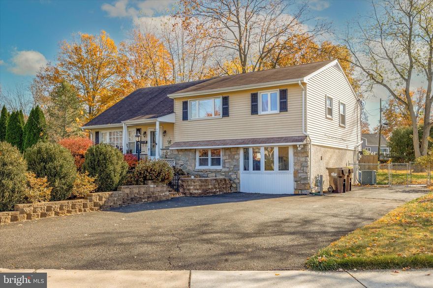 Welcome to your new home in the heart of Inglewood Gardens! This spacious 4-bedroom, 3-bathroom split-level is on a great corner lot in the sought-after North Penn School District, near Inglewood Elementary and Penndale Middle School. Step into an inviting living space that seamlessly transitions from the welcoming living room to the dining area and well-appointed kitchen featuring granite countertops and sleek soft-closure cabinets. A slider opens up to a private backyard oasis, creating a perfect blend of indoor-outdoor living. The main level showcases a harmonious open layout adorned with Brazilian cherry hardwood floors. Ascend a few stairs to discover the primary suite, illuminated by recessed lighting and accompanied by an en-suite bathroom. Two additional generously sized bedrooms on this level share a tastefully designed hall bathroom with a skylight, creating a bright and airy ambiance. Venture up a few more stairs to unveil a versatile bedroom with convenient attic access for storage needs. The lower level of this home presents an expansive family room graced by a cozy gas fireplace, a full bathroom, a sizable laundry room, a practical mudroom, and seamless access to the backyard—forming an entertainer's dream space. The outdoor haven features a meticulously crafted stamped concrete patio, two gas connections for convenient grilling, and a spacious shed to accommodate all your storage needs. Ideally situated, this residence offers proximity to shopping, restaurants, major highways (I-476 and 309), and is just 2 miles from the Lansdale Train Station. To provide you with added peace of mind, this home comes complete with a 1-year America’s Preferred Home Warranty. Don't miss the opportunity to make this exceptional property your own—schedule your appointment today!