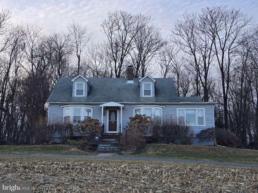 Charming Cape Cod Retreat on Nearly an Acre with Valley Views

Nestled on .80 acres in the Mount Airy area of Howard County, this charming Cape Cod–style home offers a rare blend of peaceful rural living and everyday convenience. Overlooking a scenic valley and backing to mature trees, the property is a haven for nature lovers, with abundant landscaping and frequent visits from wild birds.

The home features 3 bedrooms and 2 full baths, with the primary bedroom conveniently located on the main level. Offering approximately 1,800 square feet above grade, the interior is warm and inviting, highlighted by wood floors, cozy finishes, and timeless charm throughout.

The kitchen offers abundant cabinet space, ideal for cooking and entertaining, while a dedicated office provides flexibility for remote work or hobbies. A finished basement expands the living space and includes central air, making it comfortable year-round. Additional features include oil heat, generator hookup, and new siding, adding both comfort and peace of mind.

Outdoor living is equally appealing, with a covered rear porch perfect for relaxing and enjoying the natural surroundings, a large side yard, and beautifully maintained landscaping. A detached two-car garage provides ample storage and parking.

Though the setting feels private and serene, the location is exceptionally convenient—just minutes to Interstates 70 and  easy access to Interstate 270,  Fort Meade, Frederick, and Baltimore. The property is also served by highly regarded Howard County schools.

This is a special opportunity to enjoy space, charm, and tranquility without sacrificing accessibility.

Additional photos will be uploaded on 01/16/2026

Offers welcome and appreciated.