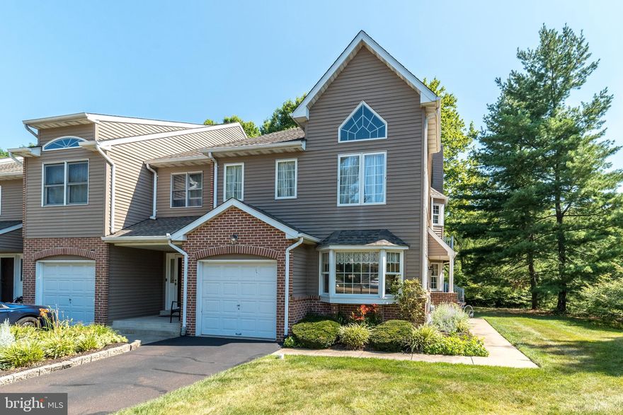 GREAT NEW PRICE! Welcome to 50 Piccadilly Circle in the desirable Charing Cross of Cental Bucks County! This end unit has one of the larger floor plans with many features. Located in a wonderful setting with a private side entry, TWO decks, and mature trees surrounding the home.  Upon entering the home you'll find the entry with a half bath and closet. Off to the left is a sunlit large office with a beautiful bay window. The kitchen has newer cabinets and stainless-steel appliances. Completing the first floor is the dining room and living room, with a fireplace, which flow nicely together creating a great space for entertaining. Sliding doors off the living room lead to one of the decks with stairs to the back yard area (convenient if you have a dog to walk). If you need extra space, there is an unfinished basement for storage or a future finished area for a game room or exercise room. Upstairs is beautiful primary bedroom with a walk-in closet, full bathroom, second fireplace with sitting area, and sliding doors to another new deck.  There are two additional good size bedrooms, a full bathroom and laundry located on the second floor. This community has a playground and basketball court, with proximity to the charming Borough of Doylestown with shops, movie theatre, museums, restaurants, Peace Valley Park and Doylestown Tennis Club.