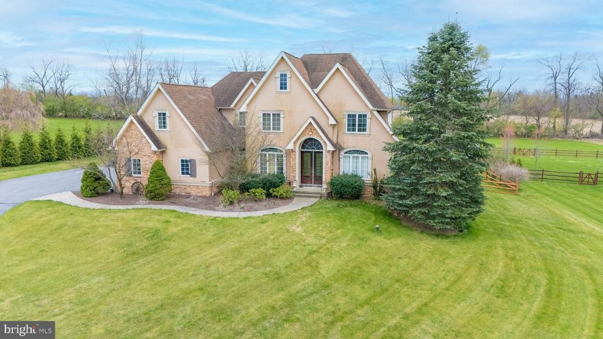 Welcome to your dream home in the highly sought-after Nazareth School District! Situated on a quiet cul-de-sac, this impressive 5-bedroom, 2.5-bath home greets you with illuminated stone pillars and a curved driveway that sets the tone for the elegance inside. The heart of the home is the spacious kitchen, featuring granite countertops, stone accents, tall cabinetry, and a large center island—ideal for everyday living and entertaining. A private den with French doors provides the perfect space for a home office or study, while crown and picture frame moldings add timeless detail throughout. Upstairs, you’ll find four generously sized bedrooms, including a luxurious master suite with a tray ceiling and an adjoining retreat—ideal as a nursery, home office, or private lounge. The master bath offers a relaxing Jacuzzi tub and plenty of space. The finished basement adds even more living space with a family room, a recreation room, and a fifth bedroom—perfect for guests or extended family. Step outside to a 25x26 stone patio, perfect for hosting gatherings, along with a partially fenced backyard. A 3-car garage and extended parking pad offer plenty of room for vehicles and storage.