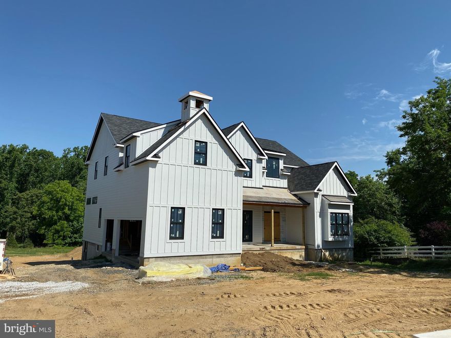 Quick Delivery Home  Available  Fall 2020. Great opportunity to bring your style to life by choosing interior finishes. One-on-one meetings with our design team to create the home of your dreams.  Customizable choices are: Kitchen Design with your input on kitchen layout, kitchen cabinetry, kitchen countertops, plumbing & lighting finishes.  Bathroom Design (7):  tile for each bathroom, with options of plumbing & lighting fixtures. General Design: choice of hardwood wood flooring, paint colors, lighting fixtures throughout, etc. This carefully architecturally designed farmhouse with a touch of modern/contemporary feel measures at over 6700 sq ft and sits on a ONE acre parcel on a quiet & secluded street that oversees the Nature preserve of Andorra Meadow and it is steps away from the Wissahickon Environmental Center. This 3 car garage home has 4 guest bedroom suites plus the entire west wing of the home holds the master suite. The master suite has 2 separate walk-in closets and a private sitting area with a fireplace and french doors that lead to the private roof deck. The master bathroom consists of a double vanity, a private water closet, a "spa" like free-standing soaking tub and luxury dual shower head and body spray system.  Conveniently located on the 2nd floor a walk-in laundry room with custom built-in cabinetry and a utility sink. The first floor plan consists 12' ceilings, 2 story foyer and great room, living room with a  fireplace, a private study room with French doors, dining room, nook room and a sun room that leads to a walk out porch with an exterior fireplace. This gourmet kitchen features Wolf and Sub-Zero appliances, (again) your choice of countertops, designer style backsplash and custom kitchen solid wood custom cabinetry. Also located on the first floor are 2 powder rooms and a mud room with an optional dog shower.  Home also offers a SMART Technology package that includes devices such as Ring Doorbell, Nest thermostats, Built-in Sound System (interior/exterior of the home), Electronic Door Lock System and USB outlets throughout.  This home is located a short distance from Chestnut Hill shopping and restaurants and also a short train ride to center city.  Make an appointment for a private showing with the listing agent to view plans and get further information home specifications and interior finishes. Property located in Springfield Township.--Note--Philadelphia address is for mailing purposes only.