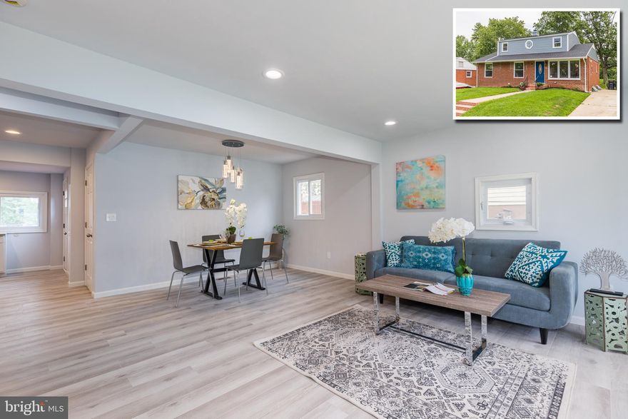 A must see beautifully redone interior.  All new plumbing, gas lines, electrical wiring with permits.  The interior has a beautiful open-airy atmosphere. A totally reconfigured kitchen. There are a total of 6 nice size bedrooms, with 1 bedroom upstairs with a sitting room/office.  There are three new  full bathrooms; one on each floor.  New HVAC, all new windows,  all new appliances, Black SS, with new washer/dryer in the basement.  There are 3 bedrooms on the first floor and two legal bedrooms in the basement.  The basement is fully finished with a great room,  large enough for entertainment.  There is a full deck in the back with a large backyard.  Some of the rooms have electrical outlets which include USB for charging small electronics.   THIS IS TRULY A MUST SEE PROPERTY!