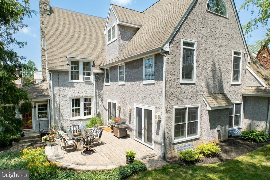 Stately Stone Beauty on Dean St in West Chester Boro! Walk uptown to Restaurants or over to Everhart Park in 5minutes!  Quiet Private Location  Enjoy morning coffee OR evening cocktails on the Front or Rear Terraces with the sounds of nature. Old World Charm & Craftsmanship melded with 21st Century amenities.  c1929  4405sqft  5Bedrooms  4.3Baths  .27acres  Absolutely Awesome Architecturals!  Lives larger than it looks! Comfortable & Cozy yet Exceedingly Spacious!  Main Level 1900Sqft:  Foyer, Powder Rm, Living Rm: Ribbon Pointed Stone Fireplace, French Doors Open to the Study/Den, Kitchen & Great Room OMG  the heart of this home! LARGE Open Space to Accommodate your Friends & Family Gatherings,  Double Atrium Doors to the Fenced Sun Drenched Backyard… ALL an Entertainers Delight! Upper Level1: Stunning Owner’s Suite: Cathedral Ceiling, Walk-in Closet, EnSuite Bath PLUS a Loft/Office Overlook, Laundry Room, Bedroom2 w/EnSuite Powder Rm, 2Additional Bedrooms, Hall Bath.  Upper Level2: Petite Retreat: Bedroom5 & Shower Bath!  Walk-out Lower Level: Bonus Rm, Shower Bath, Exercise Rm + Storage. Always plenty of parking (Permit) on this block of Dean St… Driveway & Motor Court Parking as well.  This Owner at one point needed parking for 7cars!  The Best Street & Life Style ever!  come discover more…