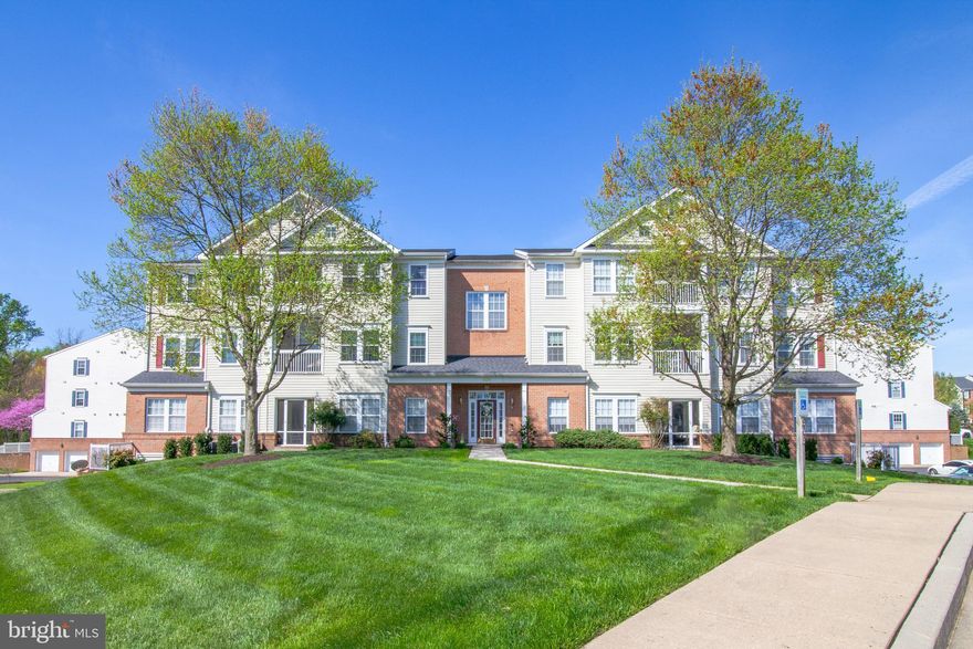 Move-in ready 2 Bedroom, 2 Bath penthouse condo in desirable Spenceola!  Elevator up to the third floor, and enter your quiet unit featuring gleaming hardwood floors throughout, high vaulted ceilings, chair rail accents, and a spacious open floor-plan.  Foyer offers a convenient coat closet and brings you into a spacious Dining Room (or additional living space if you prefer), then you'll swing into the lovely Living Room with a door to the enclosed balcony which allows for a wonderful breeze bringing the outside in.  Kitchen boasts upgraded tall cabinetry for plenty of storage, pantry closet, SS fridge with icemaker/dispenser, breakfast bar seating, and is open to the breakfast area with table space.  The additional space here can be used as an extended Kitchen/Dining space, TV Den, Office space...you decide!  The hall has two linen closets so storage space is never a problem.  Spacious Primary Bedroom features a large walk-in closet with custom closet system, attached Primary Bathroom with double sinks and large jetted tub.  Large Laundry/Utility room offers a utility sink and built-in cabinetry & shelving for additional storage.  (HWH 2019, furnace 2015, windows 2015, & building's roof recently replaced.)  Elevator or stairs will bring you down to the garage level with an oversized parking space and your own private storage room for your holiday decor, tools, etc.  Secured building with key-code access located in a well-manicured private community that offers lovely garden courtyards, community center, fitness room, and easy access to the MA & PA walking trail.   Community pool memberships are available (must sign up for membership separately.)  Convenient to Downtown Bel Air shopping, dining, and entertainment.  Call today and call it HOME!