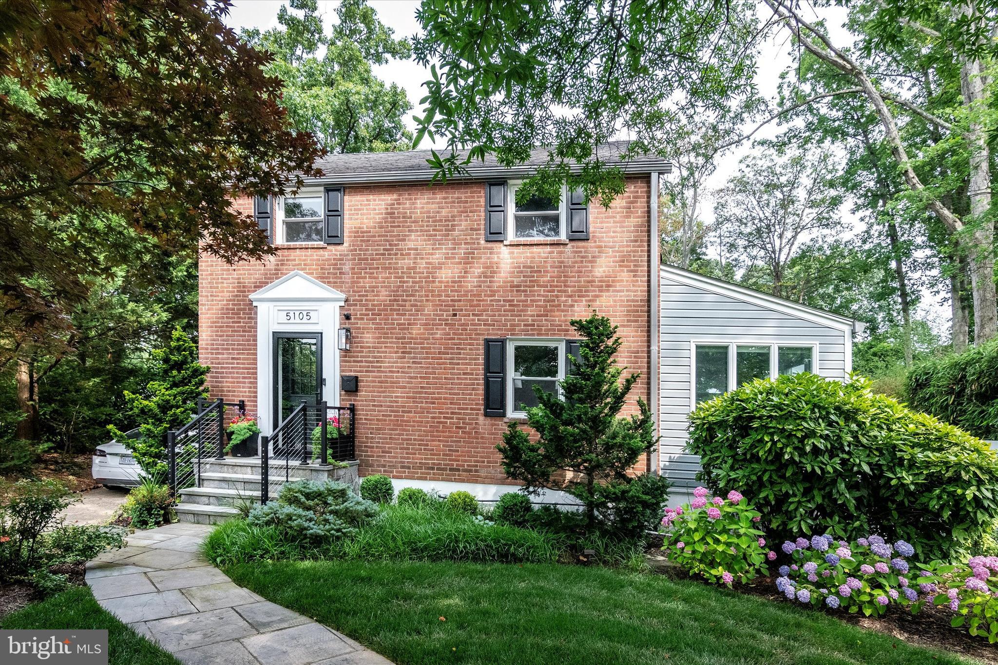 Welcome to this stunning Arlington Forest gem—where timeless charm meets modern sophistication. Nestled on an expansive lot that spans nearly half an acre (41%), this beautifully remodeled 2,766 sq ft home sits on one of the largest parcels in the neighborhood, offering rare outdoor space and privacy. Step outside to your own private oasis: a professionally landscaped, park-like backyard featuring a custom water feature with a waterfall, lighting, filtration system, and even an automatic fish feeder for those who dream of a koi pond. Entertain with ease on the spacious patio, complete with a built-in gas BBQ system including waterproof covers. The screened-in porch boasts motorized retractable screens and a custom outdoor bar with a dual-tap Marvel kegerator, beverage fridge and 2 Bromic infrared heating system. All existing outdoor and porch furniture conveys with the house so you can enjoy outdoor living from your first day of ownership, while the smart sprinkler, perimeter fence lighting, and outdoor security cameras ensure both beauty and peace of mind. Inside, the home welcomes you with rich hardwood floors and a layout designed for both comfort and functionality. The main level features an elegant living room with a dual-sided smart electric fireplace that flows into a comfortable family room with nearby remodeled powder room. A gourmet kitchen elevates the home, with custom white cabinetry, granite countertops, under-cabinet lighting, and an oversized island equipped with a sink, instant hot water dispenser, and water filter. Designer pendant and recessed lighting add a soft, inviting glow. High-end stainless steel appliances—including a five-burner gas range—make this kitchen a chef’s dream, while the custom bar featuring bistro shelving over a live edge wood counter make this an entertainer's dream. The sunroom, bathed in natural light from surrounding windows, features heated floors, automatic blinds, and a custom barn door, creating a perfect retreat. Upstairs, the luxurious primary suite offers a spa-inspired bathroom with heated floors, a soaking tub, dual granite vanities, and a walk-in shower adorned with designer tile. A large walk-in closet and a thoughtfully designed laundry room add convenience. Three additional bedrooms and a fully remodeled hallway bath complete the upper level. The fully finished basement, accessed through another custom barn door, leads into a versatile recreation room, three quarter bath, wet bar with beverage fridge, and a large storage room with built-in shelving and a new combo washer/dryer. A dedicated utility room houses a dual-zoned electric HVAC system with Nest controls and a tankless water heater. Custom closets throughout the home provide ample storage. Every inch of this home has been thoughtfully updated within the past year. Located just steps from the W&OD bike trail and minutes from shopping, dining, DC, the Pentagon, and National Airport—this is Arlington living at its finest. Don’t miss your chance to own this exceptional property.