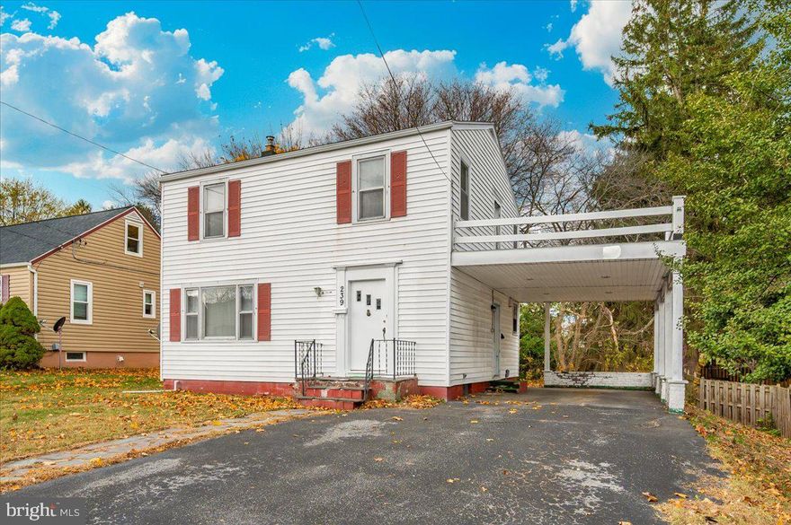 AN ABSOLUTE MUST SEE! Conveniently located on a quiet street just minutes to I-81/I-70, grocery stores, restaurants, and shops, this charming and meticulously-kept home boasts over 2,200 square feet and is the perfect home for those looking for a spacious single family property at a great price! This gem features 3 spacious bedrooms, separate dining and living rooms, and a very large sunroom that's perfect for entertaining guests by the fireplace! Additional features include beautiful original hardwood floors throughout, updated bathroom, main level laundry, crafty main level french doors, and an oversized attached carport with side entrance. The exterior is wonderful, as it boasts a large flat backyard, rear patio pavers, storage shed, and the stunning side deck that sits atop the carport and overlooks the peaceful backyard and front street. Don't miss this one! Schedule your tour today!