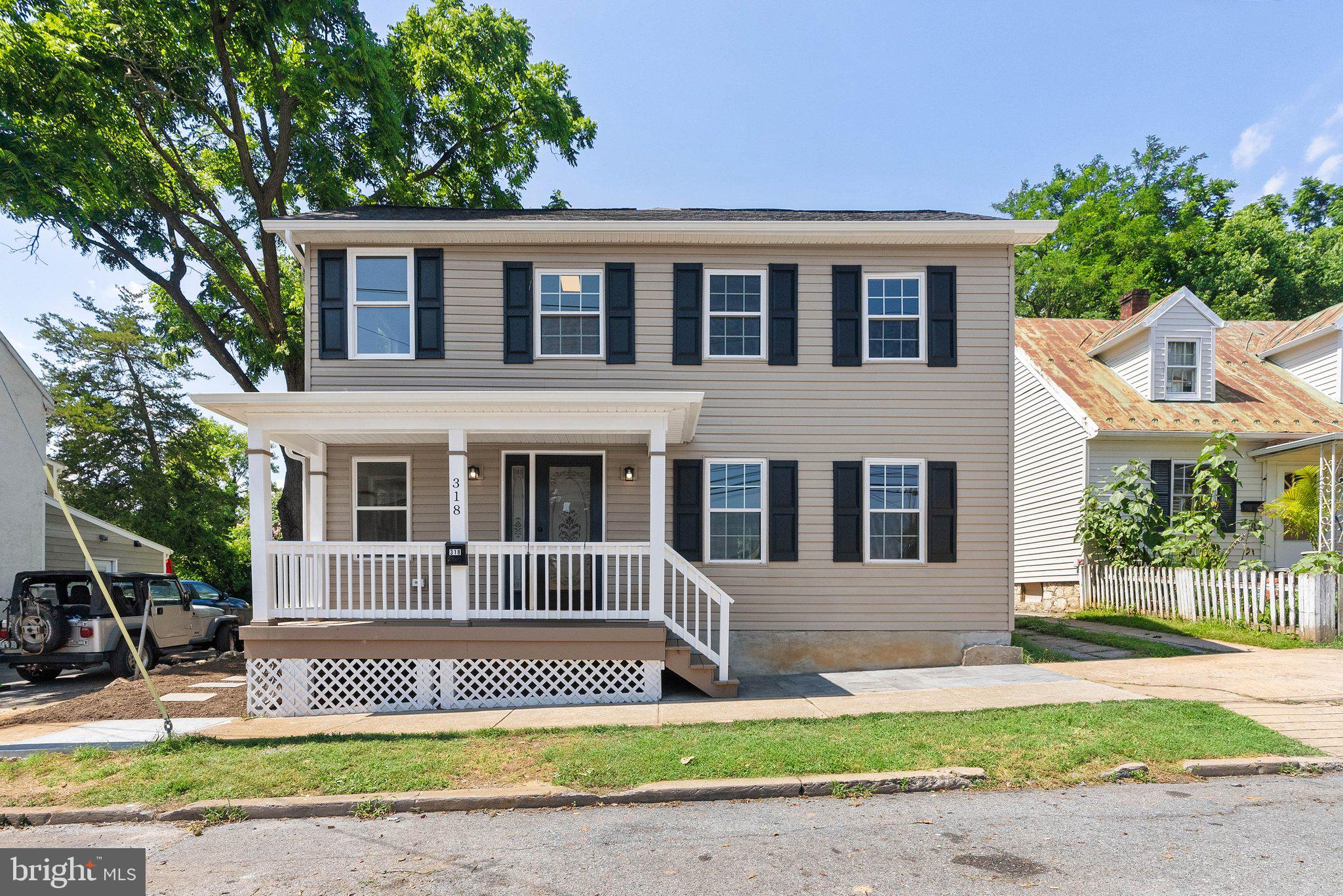This beautifully renovated 3-bedroom, 2.5-bath home blends timeless character with today’s must-haves, all just steps from historic downtown and minutes to Hollywood Casino & horse racing action. Inside, you’ll find fresh finishes from top to bottom: brand new LVP flooring, updated drywall throughout, modern ceiling fans, and a clean, contemporary color palette. The open layout offers a spacious flow with main-level laundry and a primary suite featuring a large en-suite bath. Love to entertain or relax outdoors? The inviting new front porch is perfect for morning coffee, while the rear patio sets the stage for weekend hangouts. Major updates = peace of mind: new HVAC, upgraded 200+ amp electric, and a 2-year-old roof. All that’s left to do is move in and start living! Walk to local shops and restaurants, or zip over to the casino, racetrack, or commuter routes — this location has it all. Modern updates. Prime location. Small-town soul. Come experience 318 W Liberty for yourself.