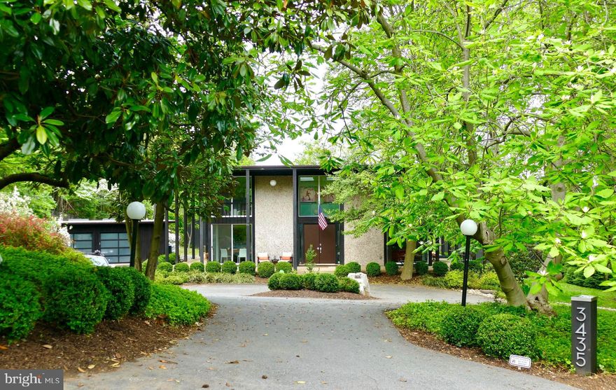 THIS BEAUTIFULLY APPOINTED BRIGHT & AIRY CONTEMPORARY HOME FEATURES FIVE BEDROOMS, FOUR AND A HALF BATHS,  OVER $200,000 OF IMPROVEMENTS (OVER THE LAST FEW YEARS, INCLUDING A NEW ROOF- NOVEMBER OF 2018), A DETACHED TWO CAR GARAGE, AND A CHARMING  20,000 SF TREED LOT IN SOUGHT-AFTER BELLEVUE FOREST.   EXCEPTIONALLY LARGE WINDOWS AND SKYLIGHTS  THROUGHOUT  BATHE THE INTERIOR IN BOUNTIFUL  NATURAL LIGHT WITHOUT SACRIFICING PRIVACY,  WHILE THE OPEN FLOOR PLAN - WITH AN EXPANSIVE LIVING ROOM WITH FIREPLACE - GRACIOUSLY AFFORDS A PERFECT FLOW. THE UPSTAIRS HAS THREE BEDROOMS - ASIDE FROM THE  MASTER BEDROOM - WHICH HAS AN ADJACENT SITTING ROOM WITH WALK-IN CLOSET AND EN SUITE BATH. (A FIFTH BEDROOM/OFFICE IS ON THE FIRST LEVEL.) AND THE GOURMET KITCHEN OFFERS TOP LINE STAINLESS STEEL APPLIANCES, A CONVENIENT ISLAND COUNTER-TOP, A BREAKFAST NOOK, AS WELL AS A LARGE DINING ROOM SPACE JUST A FEW STEPS AWAY. ADD TO THAT AN OUTSTANDING SCHOOL PYRAMID AND CONVENIENCE TO D.C., AND YOU HAVE A SUPERB VALUE. (*NOTE TOO, SINCE THE GARAGE/STUDIO HAS A FULL BATH, IT COULD QUITE EASILY BE TRANSFORMED INTO AN ACCESSORY DWELLING/IN-LAW SUITE.)