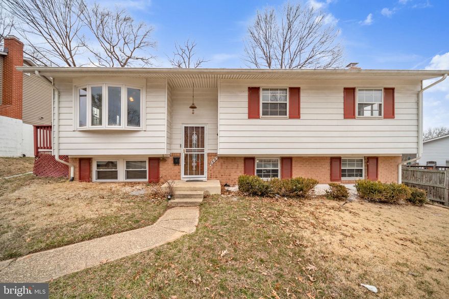 Welcome to 4554 Kinmount Rd, a spacious 4-bedroom, 2.5-bath split-foyer home located in the quiet Whitfield Gardens neighborhood of Lanham, MD. With over 2,300 square feet of living space, this property offers solid bones, generous room sizes, and incredible potential. It needs updating, but it’s priced accordingly — giving you the opportunity to renovate and design it exactly the way you want.

The main level features a traditional layout with a bright family room, dedicated dining area, kitchen, and three bedrooms, including two full bathrooms. The lower level offers a large rec room with a cozy fireplace, a versatile fourth bedroom or flex space, additional storage, and a laundry area — ideal for extended living or multi-generational use.

Situated on a 7,000 sq ft lot, the backyard includes a spacious deck perfect for entertaining or relaxing outdoors. The driveway provides convenient two-car off-street parking.

Ideally located just minutes from I-495, I-95, and Route 50, commuting into D.C. and surrounding areas is a breeze. Shopping, dining, and parks are all nearby — offering the perfect balance of suburban comfort and urban accessibility.

Affordable and full of potential — bring your vision and make it your own.
Property is being sold AS-IS.