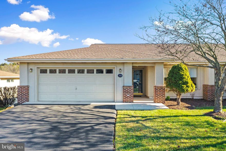 One of the best locations at Arrowhead Ridge! Located on the 3 Fairway of The Mountain View Golf Course with views of the tee, green & pond!! With in walking distance to the pro shop, driving range, Club House Grille and outdoor pool. Covered entry with full view storm door. NEW LUXURY PLANK FLOORING ON THE MAIN LEVEL. Pull down attic storage in the large 2 car garage. Laundry room with side by side washer/dryer and huge pantry off of the kitchen. Skylight in kitchen that allows for lots of natural light to flow through the room while you are entertaining with family and friends. Recessed lighting in kitchen. Open deck off of Kitchen/breakfast room & owner's suite. Large screened in porch off Great Room with awesome views of fairway #3. Two skylights and two exposed wood beams in the great room. Vaulted ceilings throughout. Owner's suite with sliding glass door to relaxing open deck, huge walk in closet & exposed wood beam. Owner's bath with double bowl vanity, private toilet area, & shower stall with glass shower doors. Den, office or second bedroom on main level with french doors and large bay window and 2nd guest bathroom. Finished lower level features the rec room/family room, two additional bedrooms, full bath, finished storage room or craft room & large unfinished storage room. Concrete patios off of rec room/family & the two bedrooms in the lower level, great for outdoor entertaining. Class A or Class B membership available until March 1, 2024 with an initiation fee of $3,150.00. This one will not last long. Make your appointment to see this great home!