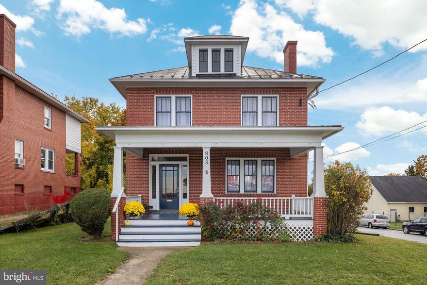 This gorgeous listing is back on the market!  Buyer couldn't sell their house, so you get another chance!  This beautifully restored historic stunner is the one you've been waiting for.  Renovated from top to bottom, this 1928 American four square retains it's original charm and provides all the modern conveniences.  Stunning original millwork, built-ins throughout, historic mantle, 1920s door hardware, original baseboards, casings, and doors; so much history!  All the major systems have been upgraded!  The generous foyer welcomes you in  where the first thing you'll notice is the warmth of the refinished hardwood flooring throughout the home.  The spacious living room is flooded with natural light and features a lovely original fireplace.  The gorgeous gourmet kitchen is a chef's dream.  Stainless appliances, quartz counters, custom hardware, fantastic lighting, and even a pot filler!  The dining room boasts the original built-in china cabinet and a beautiful barn door leading to the large half bath and laundry area.  Upstairs you'll find four bedrooms and two beautiful full bathrooms with custom tilework and fabulous finishes.  The fully floored attic provides loads of storage or could be used in myriad other ways.  The only limit is your imagination!  The full basement allows for plenty of additional storage, with two outdoor entrances and a workshop area accessible from the driveway.  The outdoor space is also abundant.  Three generous porches give you plenty of options for your morning coffee or your evening glass of wine.  There is a driveway on the side of the property and another cut in off the road that could be made into an additional off street parking area.  The nearly quarter acre corner lot stretches to the alleyway behind the property, offering loads of space.  This one has it all!!  Hurry, it won't last long...  Owner is agent.