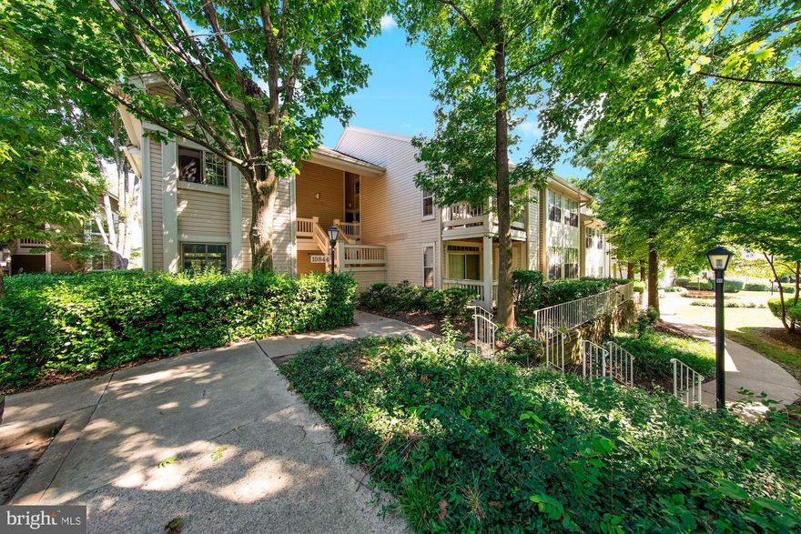 **Offers, if any, due Mon 6/28 by 8AM** Don’t miss this 2-bed, 2-bath condo in beautiful Bentley Place! Enter to bright and airy main living area with upgraded flooring throughout. Updated and open kitchen offers gorgeous wood cabinets, white granite countertops, and stainless steel appliances. Separate dining room and spacious living room with cozy wood-burning fireplace are perfect for entertaining dinner guests. Owner’s suite boasts two large closets and spa-like bath with glass-enclosed shower, upgraded vanity and designer touches. Second bedroom and additional full bath are ideally-situated to serve as either a guest bedroom or in-home office. Step outside and enjoy a morning coffee on the private covered patio with serene tree-lined views. In-unit washer and dryer! One assigned parking space plus ample visitor parking throughout. Newer HVAC (2020). Just steps to the community pool and tennis courts or Timberlawn Park with paved walking trails and playground, making this pet-friendly community ideal for keeping active. Conveniently located less than a mile to Balduccis, Starbucks, Fish Taco, Whole Foods and the Grosvenor-Strathmore Metro (red line)! Endless restaurant and shopping options at nearby Pike & Rose or Montgomery Mall. Walter Johnson HS cluster!