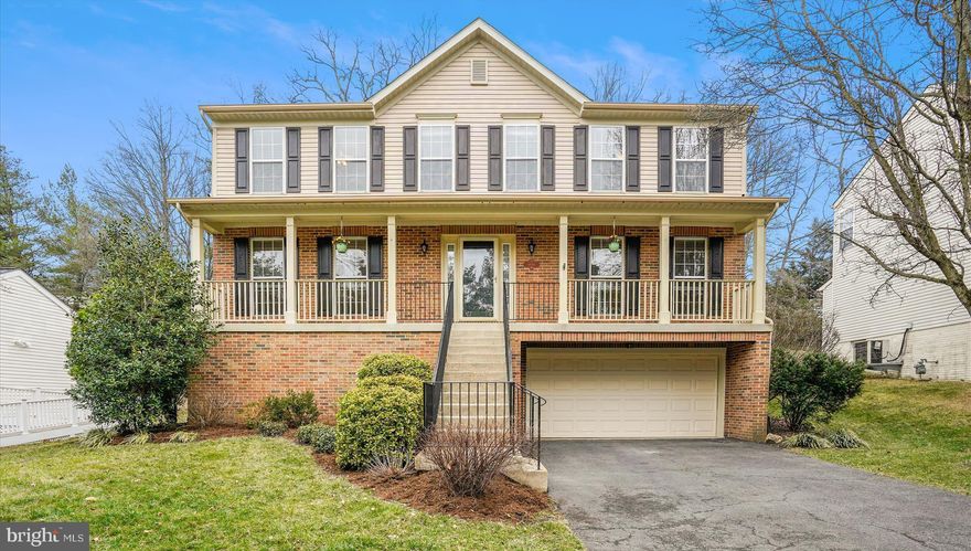 Stunning and stately in sought after Raceway Farms community! Spacious colonial with pristine hardwood floors, beautiful 2 story foyer, eat-in kitchen that flows perfectly into the family room with vaulted ceiling, cozy fireplace, and wall of windows with tree views. Bright kitchen has island, stainless steel appliances, silestone countertops, pantry, and eat-in space with French doors that lead to sunroom overlooking the back yard. Simply perfect for relaxing. The main level also boasts a generously sized  living room/home office with gleaming wood floors, graceful dining room with crown molding, and chair rail; and a laundry room, and half bath. The ideal floor plan and flow! Upstairs are four sizable bedrooms, all with immaculate wood floors, including a primary bedroom with vaulted ceiling, tree views, and a luxurious primary bath with double sinks, walk in shower, soaking tub, and a walk-in closet. The other bedrooms all have tree views, and an abundance of natural light. The beautifully finished lower level has recreation room/game room/guest suite, with gorgeous flooring, recessed lights, and an attached lovely, remodeled full bath. Serene tree views in both the front and back, charming porch, deck for grilling, and an attached oversized two car garage with workshop, storage, utility sink, plenty of room for cars, and added 50A/250V electrical outlets. Backyard has green space, and tiered landscaping that leads to private patio. Fresh paint. New roof, gutters, dishwasher, washer, dryer, exterior lights and more! Just minutes to Metro, Fort Belvoir, shops, restaurants, Wegmans, schools and major commuting routes. Welcome home!