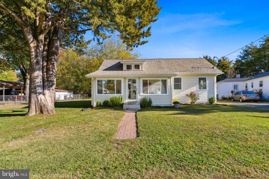 Welcome Home to this charming and beautifully updated home in the desirable Saint Clements Shores Community in Leonardtown, MD.  Whether you are looking for a peaceful second home retreat or an active waterfront community primary residence lifestyle, this home has it all! From the picturesque setting to the short walk across the street to the water. you will be impressed.  Featuring 2 bedrooms and 2 full bathrooms, a modern open flexible floor plan, creating a spacious and inviting living space. The sunroom is currently being used as a lovely potential 3rd bedroom.  The kitchen boats gorgeous painted cabinetry and newer appliances making meal preparation a delight! Enjoy the beauty and ease of maintenance with luxury vinyl plank flooring throughout the entire home!  The house and shed have newer roofs (replaced in Nov 2021), providing peace of mind and added value to the property.  A huge 12’ x 16’ storage shed provide plenty of space for all your storage needs. For boat enthusiasts, there are three community boat ramps to choose from, ensuring you have easy access to the water.  The community also offers a community pier, waterside picnic area, community beach and a playground, perfect for family outings and gatherings.  Located just a short drive to popular restaurants, shopping and wineries in Leonardtown. Don’t miss out on the opportunity to make this stunning home your own.