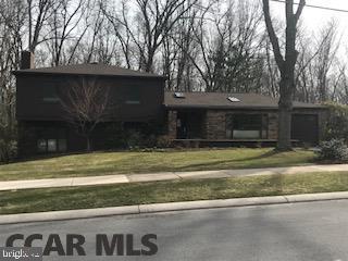 Tranquility & peace abound in this artfully designed home. Although it feels like it is in the country, the home is 4 miles from the Penn State campus! Planned for both quiet living & large group entertaining,this place has it all. The wall of windows overlooking Green Hollow Park bring the park into the Great Room & Kitchen.High ceilings & skylights add to the feeling of indoor/outdoor space.Strategically located woodstove creates comfortable warmth in the winter, with a conveniently hidden space for kindling & wood storage. An open fireplace in the Family Room adds another warm area to the long winter evenings.Come spring, a three-season outdoor hideaway can be found in the secluded patio overlooking the park. In addition to the feel of this home, much thought has been given to its mechanicals. Installed in 2015, the 3-zone gas fired hot water baseboard heat & the "on demand" hot water heater are the latest in efficiency. Call to see your new home today!