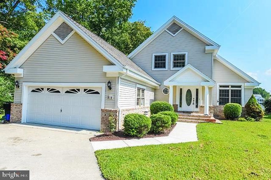 Welcome home to this stunning 3 bedroom, 2.5 bath executive home on the water.  Gorgeous views of Johnson's Pond from every room of the house.  Entering into the front foyer you are greeted with a gorgeous formal dining room with grand ceilings and tons of natural sunlight, flowing into the eat-in kitchen with tons of counterspace, new countertops going in this week, tile flooring and a pass through window to the living/family room.  The large living room offers wall to wall carpet, gorgeous gas fireplace, a sliding glass door with access to your large rear deck and also access to the attached sunroom.  Off the living room on the main floor is the master bedroom with a large walk-in closet and ensuite master bath.  Also on the main floor is a half bath for guest, a large utility room with washer and dryer and access to your oversized 2 car garage.  On the 2nd floor you have a large bonus area at the top of the steps with two huge walk-in closets, perfect for an additional family room, play area or an additional sleeping area.  Off the bonus area boasts two large bedrooms, and another full bath.  In the rear of the home you have a huge courtyard that will never be built on which gives you unobstructed views of the water.  This home is just gorgeous and is ready to be called home.