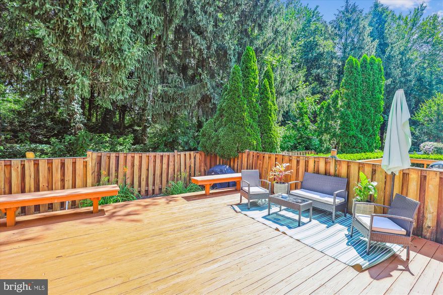 OPEN HOUSE CANCELLED SELLER RECIVED MULTIPLE OFFERS HOME IS NOW UNDER CONTRACT Park in spaces 161 in front of house/or any Visitor spot.  Location is everything!! Welcome to 4451 Holly Ave. in the highly sought-after Alden Glen Community! This well maintained, well-loved and treasured home offers 3 bedrooms, two full bathrooms and two half baths and backs to beautiful green space/trees for ultimate privacy & relaxation! Upon entering you are greeted with a sun-drenched kitchen with table space that is complete with stainless steel appliances, ceramic tile flooring and a HUGE BAY WINDOW that is perfect for enjoying your morning coffee! The open concept formal Dining Room and Living Room have beautiful hardwood floors and flow effortlessly onto the large outdoor deck, perfect for hosting friends, family gatherings or just to enjoy a quiet evening.  Upstairs you will find a generous sized Primary Bedroom (comfortably fits a King-sized bed) updated ensuite bathroom, generous closet space with plenty of natural light coming through the adorable/unique window alcoves for all three windows.  The other two bedrooms share the hallway bath and offer extra space for a growing family, guests or a home office, you decide! The spacious finished lower level has just been updated with BEAUTIFUL LVP flooring and offers extra entertaining space for families or a home gym, complete with a convenient half bath, spacious laundry room and extra storage space under the stairs. Walk to the Fairfax Transit Station easy bus access to Tysons Corner and Washington DC, minutes to 66, walk to Fairfax Corner to enjoy various restaurants, shops and theatre, Wegmans, Trader Joes, Costco, Target, Home Depot are just some of the convenient choices!  MOST RECENT UPDATES:  HOUSE HAS BEEN FRESHLY PAINTED THROUGHOUT 2025: HVAC 2022: WATER HEATER 2024: WASHER DRYER 2021: LVP FLOORING BASEMENT 2022: DISWASHER 2025