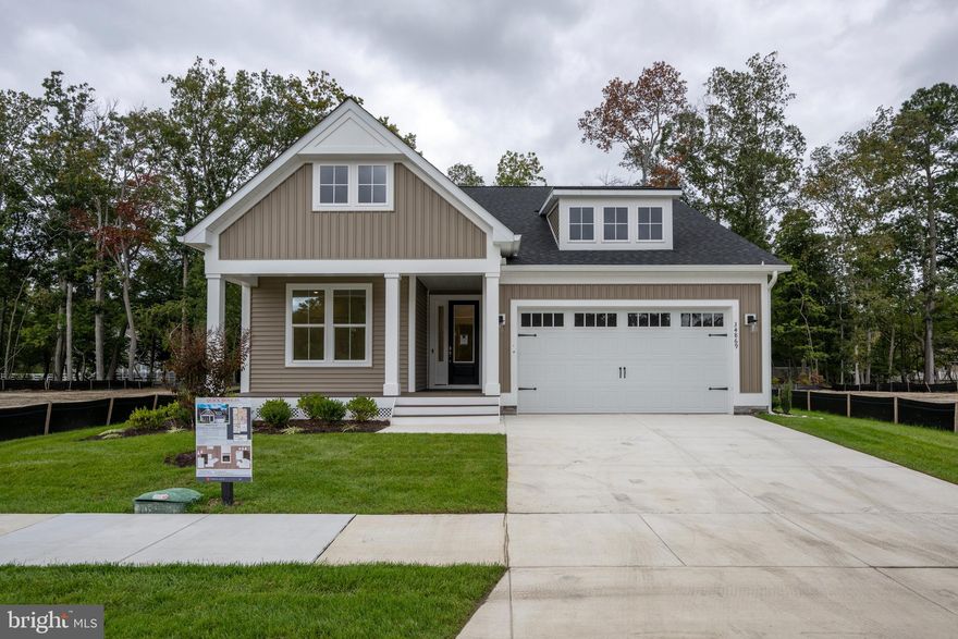 Move to the beach today! This Norfolk quick move-in home at The Knoll at Irons Lane is ready for immediate delivery.

Nestled within a private enclave of just 33 new luxury single-family homes, this community offers a serene coastal lifestyle near Cripple Creek Golf & Country Club and only minutes from Ocean View and Bethany Beach.

The Norfolk model offers 3 bedrooms, 2.5 baths, a study, a loft, and a 2-car garage, thoughtfully designed for both style and function. The gourmet kitchen is a chef’s dream with two-tone cabinetry, soft white quartz countertops, and upgraded finishes. A great room fireplace with floating mantel and shiplap surround creates a stunning focal point, while luxury vinyl plank flooring flows seamlessly through the main living spaces.

Retreat to the spa-inspired owner’s bath with a frameless glass shower and dual quartz vanity. Upstairs, guests will enjoy their own private suite and a spacious loft for additional living or entertaining space. Outdoor living shines with a covered rear porch.

As an added bonus, Foxlane Homes will pay the initiation fee and the first year of membership dues to Cripple Creek Golf & Country Club—a premier private club offering an 18-hole golf course, tennis and pickleball courts, an outdoor pool, clubhouse, and full-service restaurant.

With its unbeatable location, boutique neighborhood setting, and move-in ready convenience, this home is the perfect opportunity to start enjoying the coastal lifestyle now.