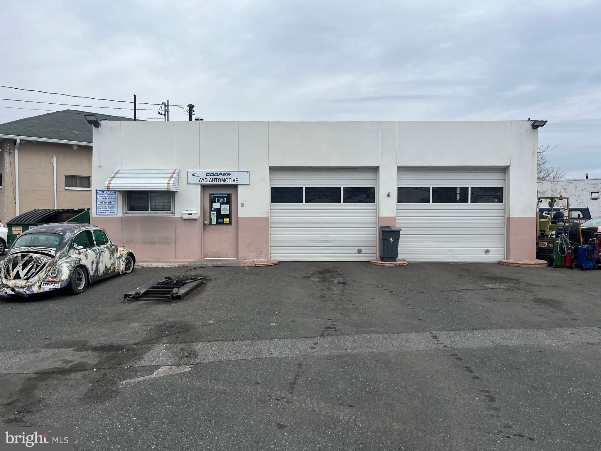 Freestanding Auto Repair Shop Building, ideal for a New Business Owner or as a Real Estate Investment. Property includes two drive-in bays and a large .419 lot, making it practical for a variety of automotive needs. Phase I and Phase II were completed/approved by MDE in 2005. Zoning is BL-AS/BL-AR (small portion). Property is being sold as is. Amenities include 2 Lifts (10,000 lb rotary), Air Compressor (04/2024) and Waste Oil Furnace (non buried Oil Tank). Please do not approach employees...all showings must have an appointment.