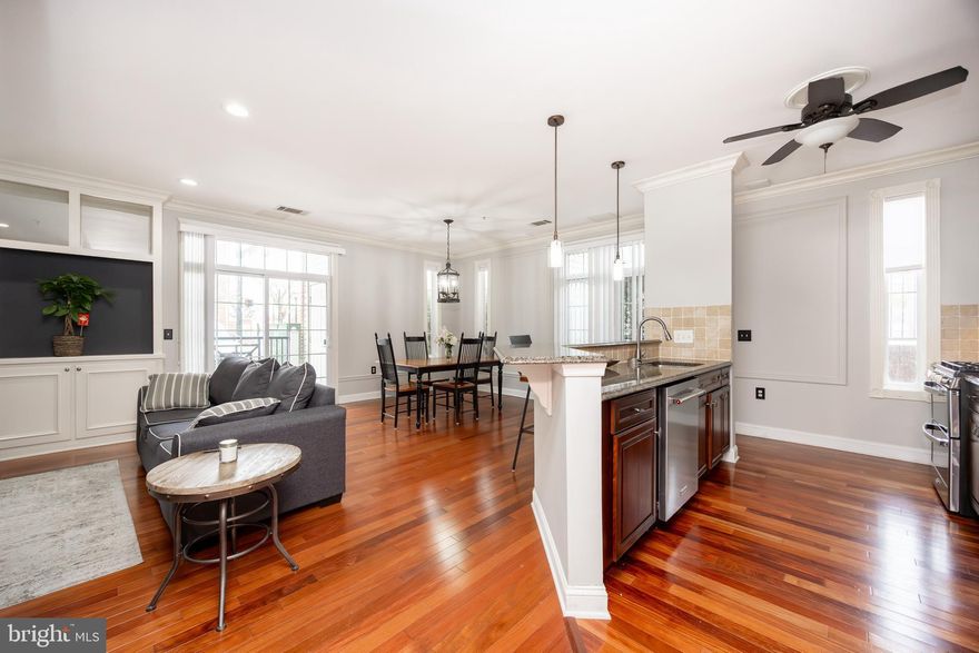 Welcome to this sun-filled 2-bedroom, 2-bath flat offering an inviting open-concept layout designed for effortless everyday living and entertaining. Natural light pours through the main living spaces, where the thoughtfully opened kitchen features a breakfast bar—perfect for gathering and staying connected. The dining area opens to two private patios, creating seamless indoor-outdoor living.

The spacious primary suite serves as a true retreat, complete with a large walk-in closet with organizer and a well-appointed ensuite bath featuring a dual-sink vanity, soaking tub, and oversized glass-enclosed shower. A secondary bedroom offers flexible use as a guest room, home office, or den and is conveniently located near the full hall bath.

Ideally situated in an amenity-filled HOA with a community pool and fitness center, the Grande at Riverview is just steps from downtown Conshohocken. Walkable to shops, dining, the SEPTA station, and the scenic Schuylkill River Trail—this home offers the perfect blend of comfort, convenience, and lifestyle. Schedule your tour today!