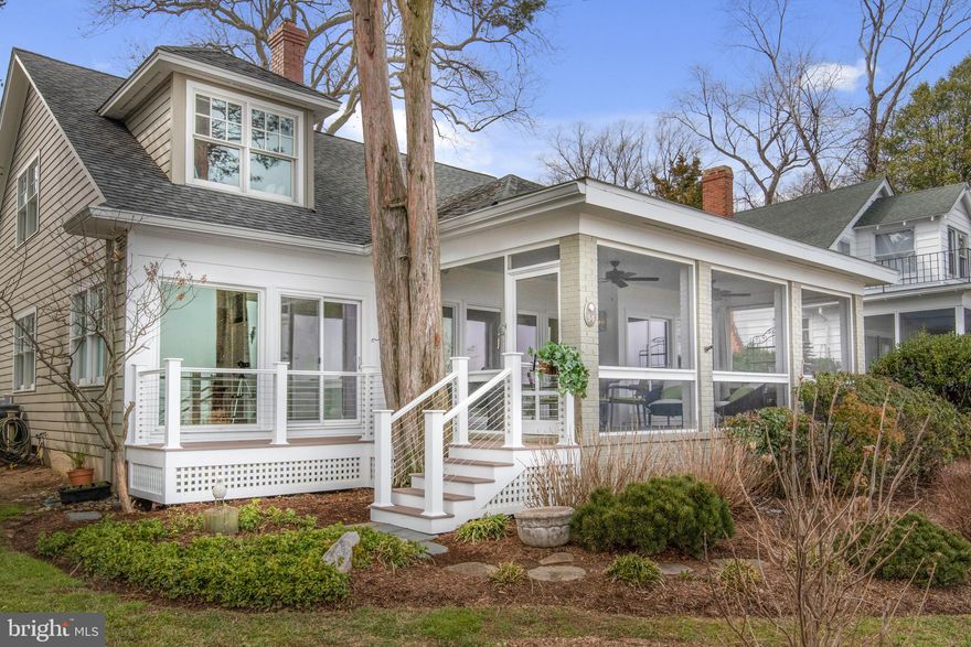 Waterfront Cape Cod renovated to perfection while retaining all the charm!  Delightful surprises at every turn.  Open living spaces with walls of windows overlooking Severn River and  Chesapeake Bay.  Three bedrooms, three full baths, glistening hardwood floors, living room with gas fireplace opens to waterfront screened porch, sitting room opens to waterfront deck, cozy den/office and sophisticated white kitchen with quartz counters, stainless appliances including six-burner gas stove and electric oven opens to wonderful IPE deck for entertaining.  Master suite encompasses second level with gracious sitting area and spa bath enjoying lovely water views.  Added bonus is the large detached office/studio including workshop and garden shed.  Amazing water views and all the treasures of Bay Ridge  -- community activities galore,  beaches, marina and swimming pool.  A magical place to live!