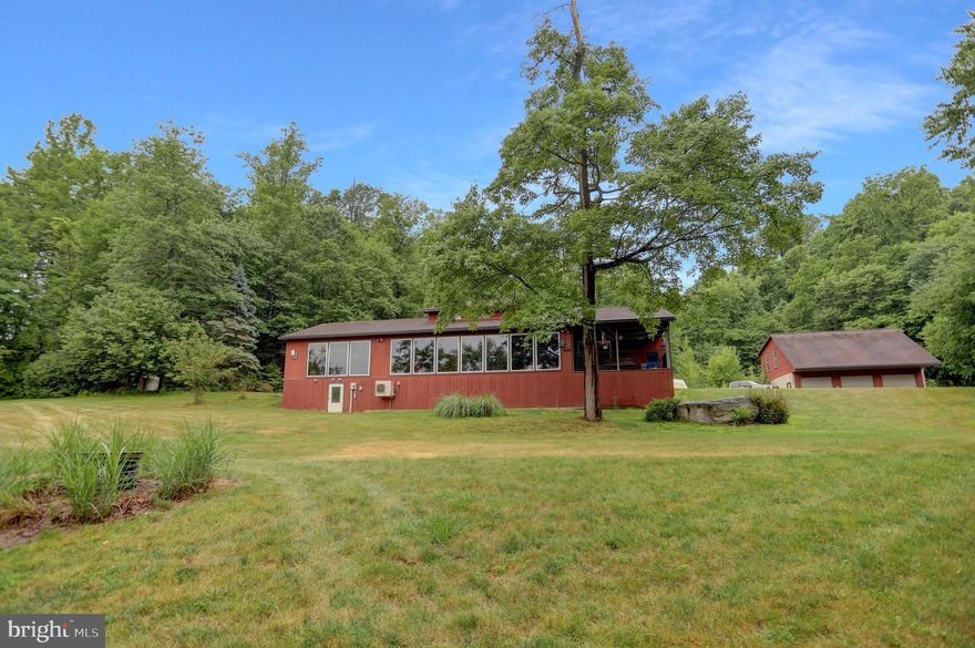 IF YOU WANT PRIVACY BUT YET NOT FAR OFF THE BEATEN PATH THIS LOVELY 3 BEDROOM, 2 FULL BATHS, LARGE MASTER SUITE, KITCHEN, DINING AREA AND LIVING ROOM ARE ONE BIG OPEN SPACE.  THE LARGE WINDOWS ACROSS THE FRONT OF THE HOUSE ALLOW A BEAUTIFULL VIEW OF THE MOUNTAINS AND VALLEY BELOW WITH LOTS OF WILDLIFE. ALL THIS ON 10 ACRES OF GROUND. THE 3 BAY DETACHED GARAGE WITH A LARGE SEMI FINISHED ROOM ABOVE JUST WAITING TO BE TURNED INTO A MAN CAVE OR WORKSHOP.  ALL THIS IS LOCATED JUST 70 MINUTES  FROM HARRISBURG AND 40 MINUTES TO STATE COLLEGE.  THERE IS AN ADDITIONA L 30 ACRES AVAILABLE FOR PURCHASE.