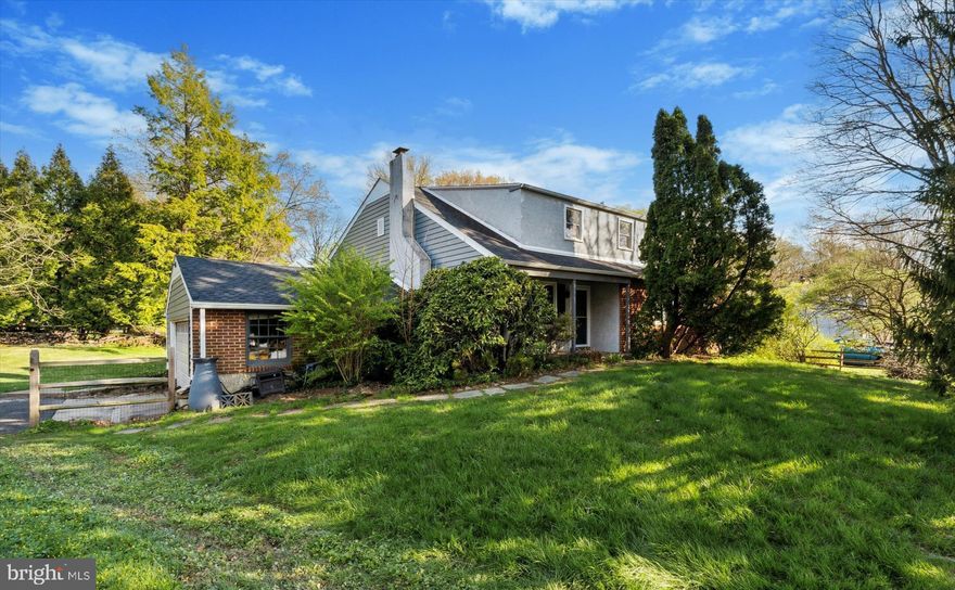 Welcome to 201 Woods Road—a spacious, 3000 sq ft + sun-filled 4-bedroom, 3.5-bath home in the heart of the Northwoods community, where space, comfort, and convenience come together. Step inside through the covered front entry, and you’re greeted by a bright and inviting main level. The living room features beautiful hardwood floors, a wall of windows, and a brick fireplace that instantly makes the space feel like home. Just off the living room, the dining area is ready for everything from weeknight dinners to big holiday celebrations.  The kitchen is a true highlight—completely renovated in 2022 and designed with both style and function in mind. There’s plenty of cabinet space including a deep pantry, granite countertops, stainless steel appliances with a double oven, a farmhouse sink, and a breakfast bar that seats three, perfect for quick bites. Upstairs, you’ll find three comfortable bedrooms, all with hardwood floors and great closet space. The primary bedroom includes a private bath with a stall shower, while the recently updated hall bath features clean, classic finishes like tile flooring and a subway tile tub surround. The top floor offers an oversized bedroom suite with tons of flexibility. Use it as a second primary bedroom, a guest or au pair space, a playroom, home gym, or a combo of all the above. With two walk-in closets, a full bath, and access to attic storage, it’s a space that can grow and change with your family’s needs. On the lower level, the large family room opens to a screened-in porch, creating a great indoor-outdoor flow for warm-weather entertaining or just relaxing with a cup of coffee. There’s also a powder room, a spacious laundry room with utility sink and built-in ironing board, and a mudroom with cubbies to keep everyone organized. The attached two-car garage connects right to the mudroom, making for smooth daily routines. Plenty of yard space surrounds the home, with a newer split rail fence and two gates. Other newer highlights to note are new electric service and panel in 2023, new garage roof and sun porch roof in 2022, and new siding, sheathing and siding on 3 exterior walls in 2023. Located in the award-winning Springfield Township School District, and close to Chestnut Hill, Keswick Village, the Keswick Theater, township parks, ballfields, and the North Hills Country Club, this home truly checks every box.  All this, plus access to the top-rated Springfield Township School District. If you are looking for space to grow, room to gather, and a neighborhood that feels like home—you’ll find it all right here!