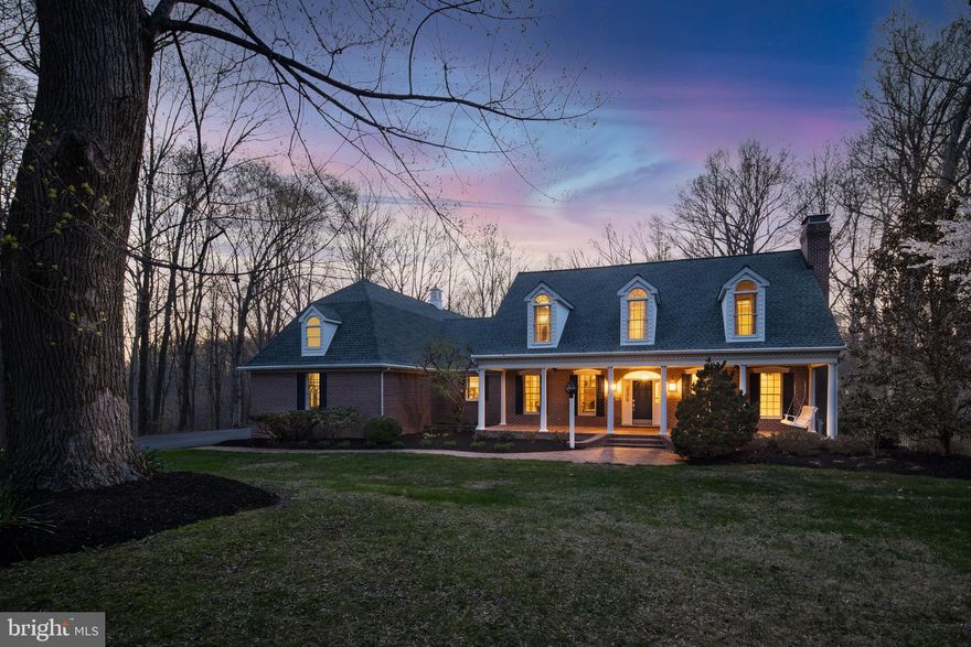 Embrace the joy of nature and luxury living with this Amazing Custom Built Cape Cod located on a 5.87 private acre lot in Churchville. Spanning 5000+ square feet, this meticulously crafted home with inviting front porch boasts 5 bedrooms and 5.5 bathrooms, providing ample space for both relaxation and entertainment. Upon entering the home, you are greeted with warmth and charm with hardwood floors, vaulted ceilings and elegant crown molding. The open floor plan boasts a large family room with wood burning fireplace, a  gourmet kitchen with rich cabinetry, granite counters,  spacious island with Wolf cooktop, large walkin pantry and separate dining areas perfect for hosting intimate gatherings or large soirées.  Retreat to the main level primary suite with fireplace boasts a renovated luxurious en-suite bath with custom closet organizer. In addition, an In-Law/Au Pair Apartment with separate entrance provides private comfortable living for family, friends and/or guests offering a spacious living room, kitchen, bedroom suite with bath and walkin closet.  Main level living is completed with a private study, wood burning fireplace and custom builtins. Center Hall staircase leads to the upper level resting quarters.  Large bedroom with private bath, two additional bedrooms and hall bath offer versatility for family or home offices. Finished lower level with walkout level boasts a living room, rec room perfect for a large pool table or exercise area, full bath, separate room and a storage area ideal for organizing and storing. French doors on both main and lower levels lead to a stunning professionally landscaped rear lawn offering a heated saltwater pool, tiered IPE decking with builtin bar, outdoor fireplace, beautiful bluestone and picturesque views creating a tranquil experience for gatherings and al fresco dining. Located just minutes from local attractions, schools, and amenities, this beautiful home with No HOA offers convenience without compromising on privacy.