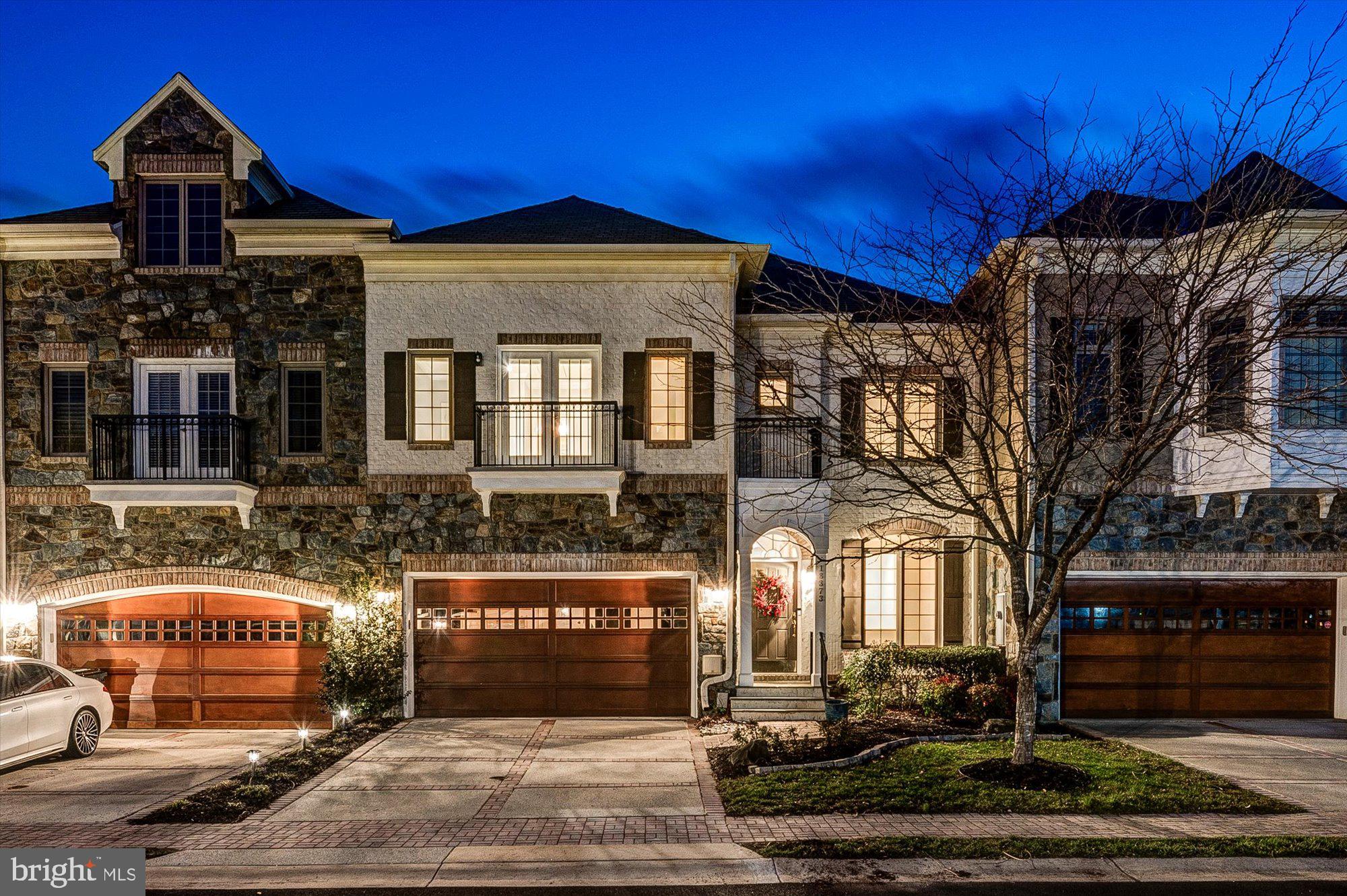 Rarely Available, Luxury Townhome Backing to the Golf Course! This Renaissance built Rachael Carson model with Sunroom is Awesome! This Home Boasts Over 5,300 sf of Living Area on 3 Levels! It Backs to the 10th and 1st Hole of the Championship Golf Course and is Just Steps from the Potomac River Overlook, Clubhouse, Golf Course, Tennis Courts & Fitness Center! Inside You'll Find a Huge "Chefs Kitchen", Two Story Family Room with Beautiful Wall of Windows, Curved Staircase, Upper Level Loft & Two Balcony's! The Primary Bedroom Suite Looks Out to the Golf Course and Enjoys Peaceful Views! The Lower Level features a Huge Recreation Room, In-Law/Nanny Suite, Full Bath & Exercise Room! The Professionally Landscaped Backyard is Fenced and Safe from Stray Balls. The Paver Patio w/ Sitting Wall is Ready for Entertaining! The River Creek Lifestyle, Priceless! *** Some Photos Virtually Staged ***