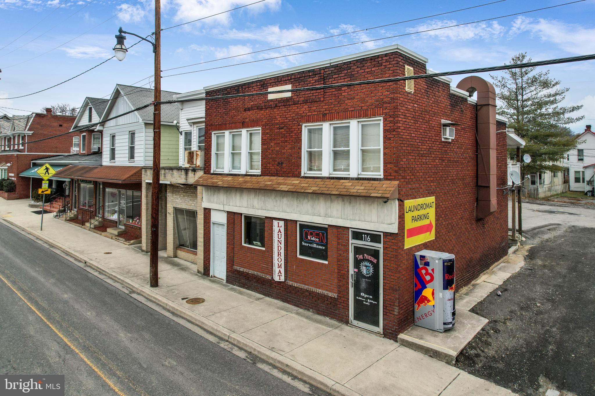 IMPROVED PRICE! Great Investment Opportunity!
Own this profitable laundromat with a long-term tenant occupying the upstairs apartment. The property features separately metered electric, with the owner covering approximately $250/month for gas, $200/month for water, and $200/month for electric. The seller nets approximately $1,200 to $1,300 per month.
The apartment tenant pays $650/month plus electric and enjoys gas forced air heating. This solid brick building is conveniently located close to all amenities. Don’t miss this fantastic income-generating property! Large parking lot! Call today to schedule a tour! Upstairs apartment does require a 24 hr. notice.