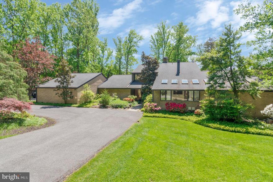 Welcome to your dream home. This exquisite contemporary luxury residence is a stunning blend of sophisticated design, modern amenities, and unparalleled elegance. Located in a highly sought-after enclave in Luxmanor, it offers an exceptional living experience for the discerning buyer.

As you enter the grand entrance, you'll be greeted by an expansive open floor plan bathed in natural light. The main level boasts a gleaming marble entry leading to hardwood floors, high ceilings, and large windows that create an airy, welcoming atmosphere. A gracious living room and elegant dining area set the stage for intimate gatherings and lavish entertaining.

The renovated gourmet chef's kitchen is a culinary masterpiece, featuring top-of-the-line stainless steel appliances, custom cabinetry, quartz countertops, and a spacious island with breakfast bar seating. Adjacent to the kitchen, the inviting family room is centered around a cozy fireplace. It has access to the Tennis Court and backyard retreat, making it the perfect spot to relax and unwind.

Upstairs, the lavish primary suite is a private retreat with a spa-like ensuite bathroom, dual walk-in closets, a dressing area, and a large sitting room with a fireplace. The additional bedrooms are generously sized, with two full bathrooms, ample closet space, and a loft room for shared space to study or relax.

The lower level offers a versatile space for recreation and entertainment, with an exercise room and full bath.

Outdoor living is a dream, with a spacious wraparound flagstone patio perfect for al fresco dining and lounging. The meticulously landscaped grounds offer privacy and tranquility, creating a perfect setting for relaxation and outdoor enjoyment. A screened-in porch and a private hot tub area lead to the lighted tennis court.

Additional features include a two-car side-load garage, storage areas, a mud room with extra refrigerators, and a separate laundry room for seamless modern living. Located just moments away from premier shopping, dining, and entertainment options, this luxury property is a rare gem.

Don't miss your chance to own this exceptional home that truly has it all. Contact us today for a tour and experience the epitome of luxury living at 6700 Arroyo Ct!