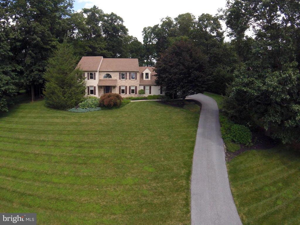 This is one of the best houses, on one of the best lots in one of the best neighborhoods. Located in the desirable low traffic section of Woodland Hills neighborhood in Lancaster County, less than a 7-minute drive to Chester County, this home has quick and easy access to Rt 30 & Rt 41. When you walk through the door of this home you will be greeted by hardwood floors in this well-lit two-story open foyer. This home is move-in ready! The 2nd floor has a large master bedroom, who's bathroom has a corner whirlpool tub, a separate shower stall, tile floors & a double sink. A large walk-in closet makes it easy to see your entire wardrobe. In addition to the MBR there are 4 other rooms on this floor. 5 rooms gives options for bedrooms, a study, an office or a large playroom.