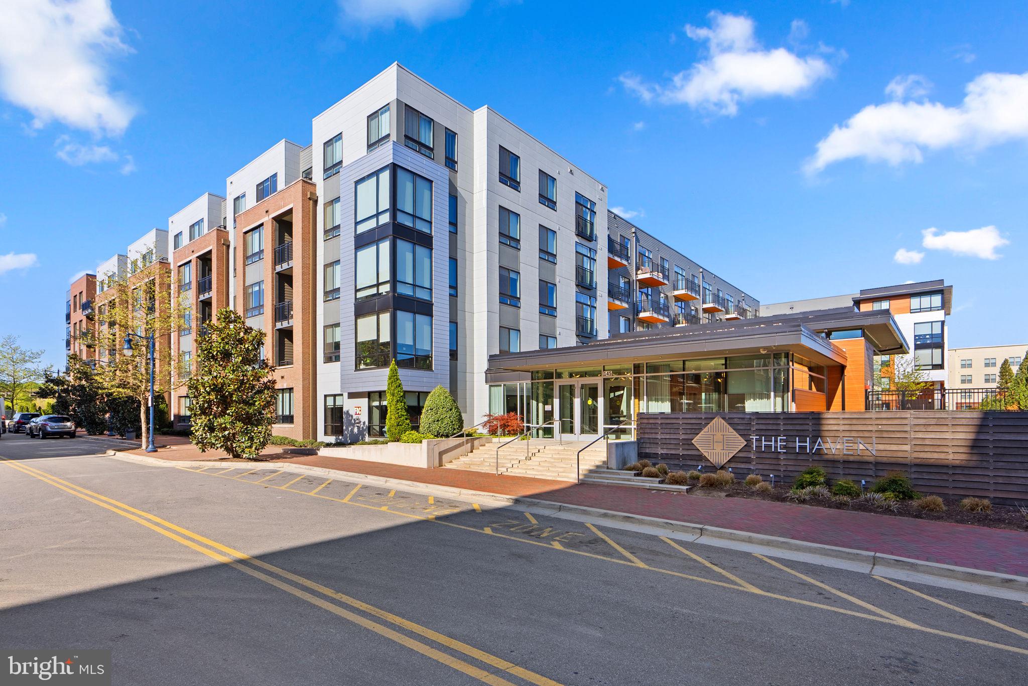 Welcome to The Haven at National Harbor, where upscale living in a waterfront community blends convenience in an unbeatable location just off I-495 on the Potomac River. This spacious 1 bedroom, 1 bathroom residence offers 766 square feet of living space, making it one of the largest one-bedroom floor plans in the building. Inside, you’ll find a gourmet kitchen outfitted with energy-efficient stainless-steel appliances, sleek two-tone cabinets, quartz countertops and custom island. The open-concept design flows to the living area, for easy entertaining or relaxing. The bedroom features a custom walk-in closet with Elfa shelving. Large windows let in loads of natural light, a Smart Home Package upgrade with Amazon Voice automation provides modern comfort and functionality and a garage parking space is also included. The Haven offers over 15,000 square feet of resort-style amenities including a sparkling outdoor pool with lounge areas, a state-of-the-art fitness facility with yoga studio, a stylish resident lounge with billiards, a pet spa, bike storage, and more. From this prime location in the heart of National Harbor, you have over 160 shops, restaurants, and entertainment options at your fingertips — from world-class dining to waterfront activities and events to the nearby outlet center. Need to get around? From here, just hop on I-495 or I-295 for easy access to downtown DC, Old Town Alexandria, or Reagan National Airport. Welcome home to National Harbor and living at its finest!