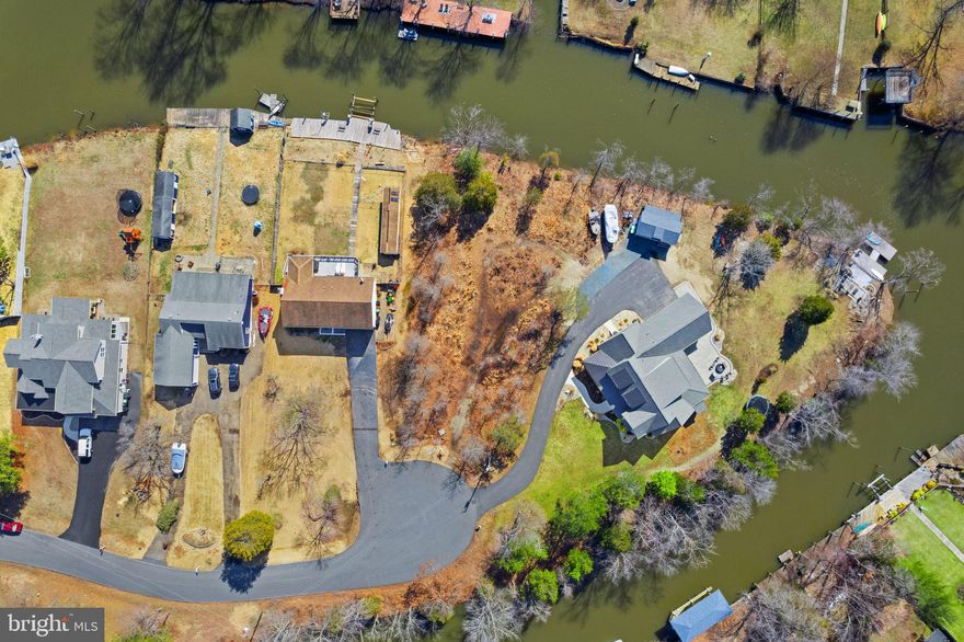 This beautiful, nearly 1/2-acre waterfront lot in Aquia Harbor is the perfect place to build your dream home! Located just minutes from I-95, commuting is a breeze, while still offering the serenity and natural beauty of waterfront living. The best part of this property is that it has 135' of waterfront, comes with NO need for establishing a septic field for waste management, NO drinking water well installation, and NO tree clearing/site development—and even has a FIOS connection! 

The gated Aquia Harbor community boasts exceptional amenities including swimming pools, a marina, a golf course, a Clubhouse restaurant, and stables with both indoor and outdoor riding arenas. Enjoy plenty of outdoor activities with ball fields, tennis courts, parks, playgrounds, and fishing areas.

With its prime location just minutes from I-95 and abundant amenities, this property offers an unmatched opportunity to enjoy an active and peaceful lifestyle in a highly desirable community.