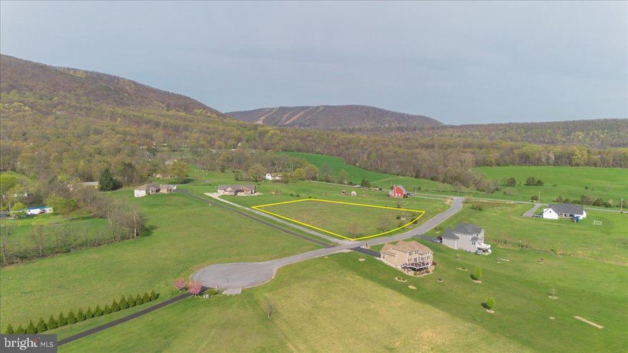 2.38 lot with stunning mountain views.  Lots of road frontage, close to Whitetail Ski Resort and ready for your dream home.