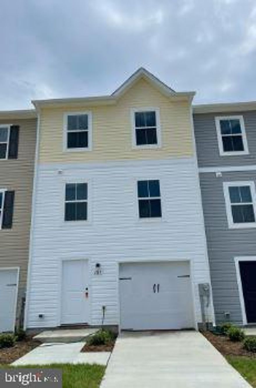 This Property is located at Dillon Farm in Hedgesville, WV. This 3-level Townhome has 3 Bedrooms, 2.5 baths, Granite Countertops, and fully upgraded appliances with Farmhouse package upgrades. This home has easy access to many nearby stores, Burger King, Martins, and other stores. Also easily accessible to Pharmacy/Medical centers / Route 9 and I-81. Perfect location for those who work in Virginia, WV, PA, and Maryland. It’s the center point of all 4 states for easy commute. This Home has Front Entrance Attached Garage with Inside Access. In the Entry level, Finished Recroom / Office Room/Bedroom(you use it as the 4th Bedroom)... The main level comes with an open-concept floor plan which has a Living room / Kitchen and Dining. The kitchen has fully upgraded appliances (Double door steel Refrigerator, Dishwasher, and Microwave) with Granite countertops. The 3rd level has a Master Bedroom with a Master Bath, and 2 Children's Bedrooms (A total of 3 Bed Rooms and 2 Full baths). Laundry Washer /Dryer is in Unit, Energy efficient windows, Gas for Water heating/ Room Heating. Pets are allowed. The security deposit and first month are due when you sign the lease. May not last long at this Home in the Market, Call or schedule the tour !!!