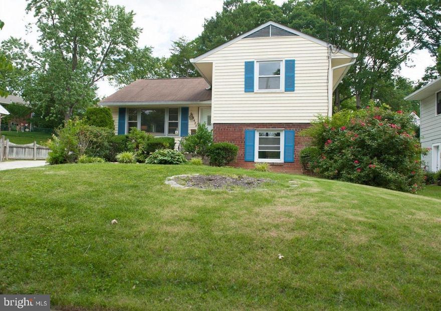 Discover this beautifully updated home in a prime location within a well-established, easily accessible neighborhood. Conveniently close to shopping, dining, and entertainment options. Fully renovated in 2020, this home boasts elegant hardwood floors throughout and a spacious, open-concept main level perfect for modern living. The kitchen is a chef's dream, featuring stainless steel appliances, granite countertops, and stylish lighting fixtures. The lower level offers a versatile basement with a private entrance and full bath, ideal for guests or added living space. Enjoy ample parking with a large driveway and unwind in the stunning backyard—perfect for relaxation or gatherings. This home seamlessly combines comfort, style, and convenience.