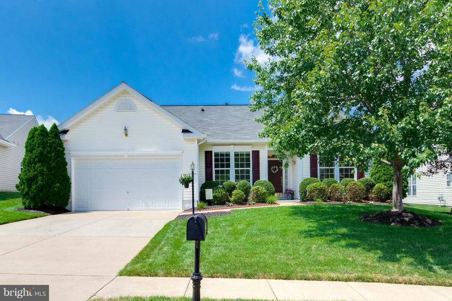 Stunning 1 level living at it's finest in a gated 55+ community*Shows Like a Model*Open floor plan*Kitchen with Corian,back splash and breakfast bar* Table space w/bay window*Family room w/ FP adjacent to kitchen*Spacious Dining and Living Room* MBR with sitting area and WIC*Master BA with shower,tub and separate vanities*Outdoor space w/gorgeous patio*Irrigation System* Too Much to Mention* A 10+