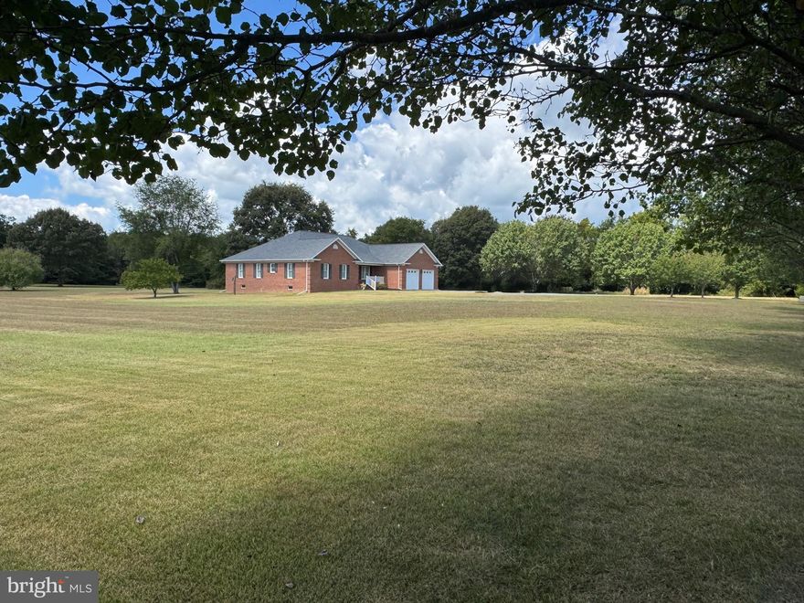 Custom home built in 2007, this home features a large eat in kitchen, a lovely screened porch over looking the park like property. Living room featuring a fireplace, and tray ceiling. to add another cozy feature. Hard wood flooring through out the living space gives that warm welcoming vibe. The property has the potential to be off the grid, the geothermal system is the basis., and a wood stove in the basement. 
The property feels like a well appointed estate with rolling fields surrounding. Yet this location is a short distance to Greensboro Boat Ramp, Dover, Denton or Easton are all a short trip. To appreciate this home is to see it, meticulously cared for waiting for the next Stewart for this property. Bring the animals plenty of area to pasture.