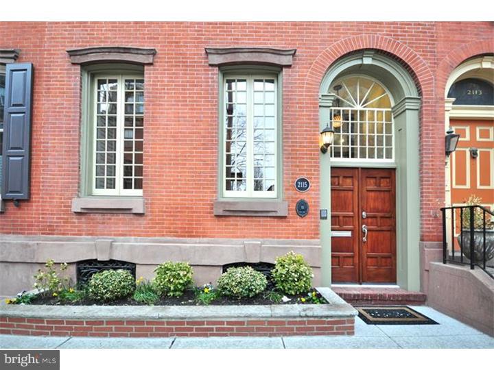 Historically certified home with bright southern exposure; fully renovated with architectural details. Front entrance adorned with marble steps and walls, lead glass transom, foyer doors, chestnut wainscoting and colonnade. First floor has LR with gas fireplace, antique French chandelier and an exit to deck area; bath with stained glass; dining area; gourmet eat-in kitchen with Sub-Zero/Wolf/Bosch appliances, 2 granite islands, 2 sinks, wine cooler, pot filler faucet and 4 French-pane doors leading to a brick paved patio with natural gas connection for BBQ grill. First floor also includes a laundry room with rear staircase access to second level. Second level has great room with full bath, wood burning fireplace, built-in bookshelves and stained glass windows; bay window room with stained glass bay windows, large window seat, gas fireplace and wet bar/catering kitchen equipped with DW, beverage center and microwave. The main bedroom and bath en-suite completes the second level and boasts 3 closets, gas fireplace, heated bath floor, soaking tub, double vanity and shower. A laundry hook-up is available in the main bath walk-in closet. Third level has 3 bedrooms with en-suite baths, zoned HVAC system and 2 staircases on either end of the home leading to the roof (roof deck potential). Finished basement with 1/2 bath, audio system closet, additional room (wine room potential) and mechanical room with zoned HVAC system. Built-in audio system in living room, kitchen and great room. Security system and intercom. Hardwood floors, antique oak interior doors, mahogany exterior doors and windows, intricate tiling, stained glass and restored woodwork throughout. Five years remaining on tax abatement. Rental garage parking 1/2 block away on 22nd and Pine or 21 and Lombard. Patio fence and gate are being replaced.