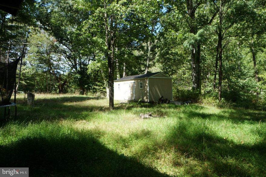 1.38 Unrestricted acres, Friends Run area w/ utilities. Lower corner in flood plain, but building site is not in flood zone.  This is a great spot for a cabin build or take advantage of the 3 hookups for water & sewer and use for a hunting camp or family getaway. Only 30 minutes from Seneca Rocks Recreation area for hiking, camping, cabin rentals, 30 minutes to Smoke Hole for beautiful scenery and fishing  or less than an hour to Canaan Valley for skiing as well as many other outdoor activities.  This won't last long, so call today!