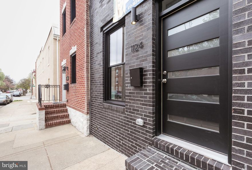 Gorgeous Renovation in the heart of Canton by Chance Development!  This spacious 3 story row home has 4 bed/3 baths, off-street parking & a roof deck!  Modern style with exquisite finishes-sand in place hardwood floors throughout, marble and ceramic spa-like baths, custom metal railings, designer light fixtures.  Gourmet kitchen has high-end appliances with 36" GE Mongram range, calacatta quartz countertops and 10 ft waterfall island. 2-zone HVAC & on demand continuous flow hot water heaters make this house super energy efficient!