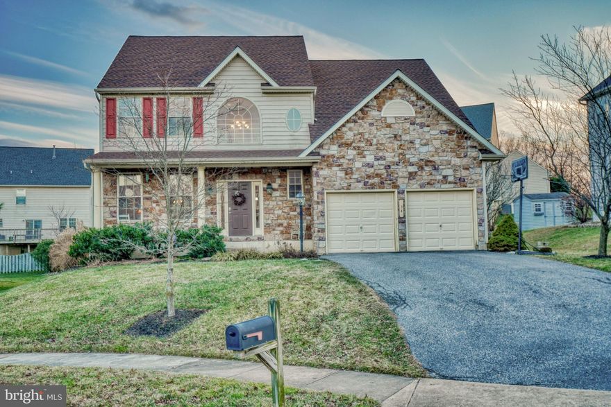 Don't miss this opportunity to live on a quiet Cul De Sac, no traffic, and great neighbors. This is one of a kind stone front, 2 car garage, 5 bedrooms, and 2 full bathrooms, and 2 half bathrooms in a sought out area in White Marsh. When you walk in you will notice the upgraded wood floors, freshly painted walls and 9 foot high ceilings.  The kitchen is connected to the family room that allows for plenty of room for entertaining. This home has a formal dining room that is connected to a formal living room. There is a gas fireplace for the cold nights to stay warm during the winters. The master suite bedroom has cathedral ceilings, and it has two walk in closets and bathroom has a stand up shower and a huge  soaking tub for those stressful days to relax in. The basement has a bedroom and half bathroom with plenty of space for a movie room. The backyard is fenced in yard and concrete stamped patio with a fabric retractable awning for the hot summer days. The roof was replaced 3 years ago. This house has everything you're looking for. This house won't last long.