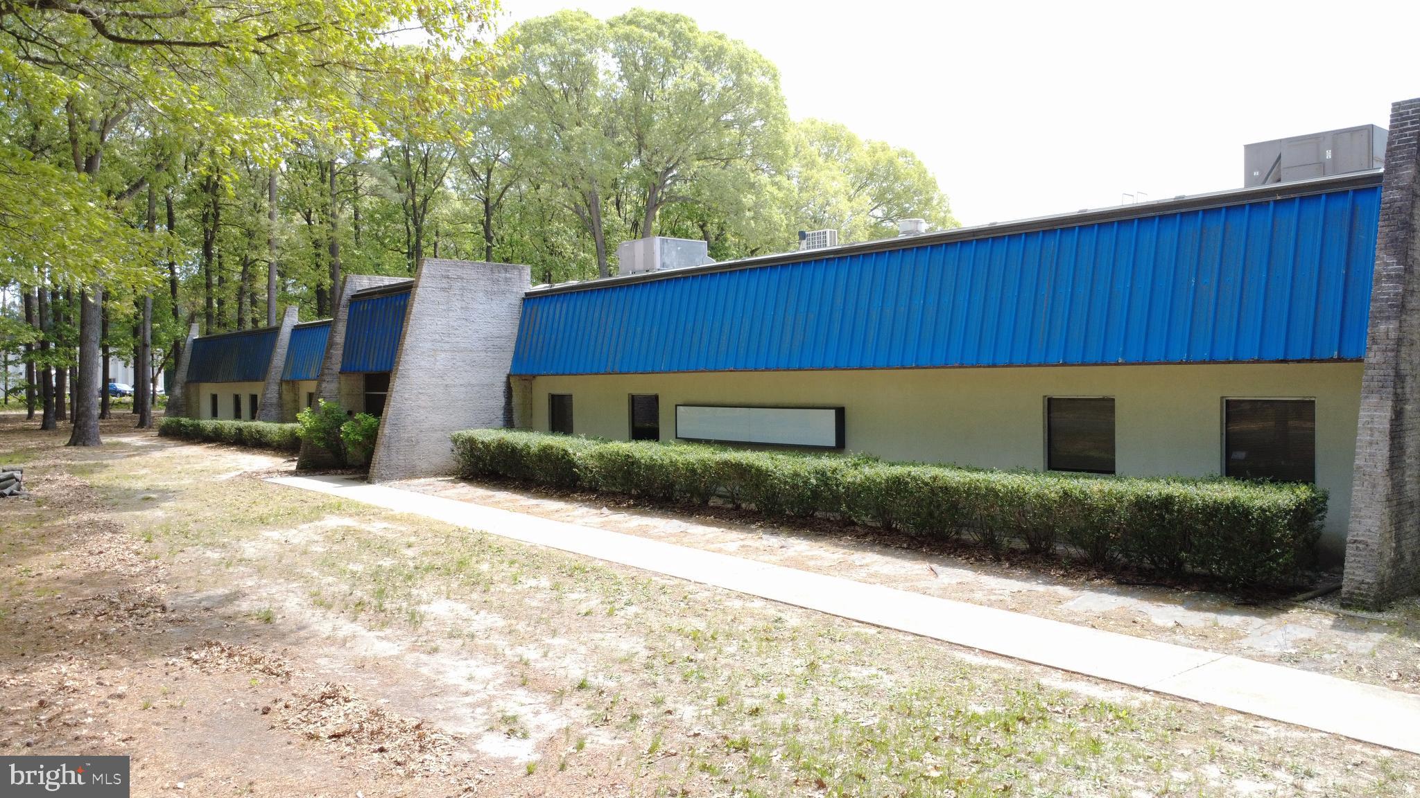 With 17,279 +/- SF and a 150 Spot/1.2 +/- Acre fenced in parking lot available for vehicles or storage area, this property offers multiple options. The parking itself can be leased for secure outdoor parking and storage for $1,500/Month by itself and/or the 17, 279 +/- SF of building with sections of 10 - 14 ft ceiling heights that are available and can be taken as one or broken up into a few creative ways with brand new interior fit outs starting at $6.25 PSF. There is also the availability to add up to 4 additional rollups for drive access or pit style dock high loading docks. Join Rite Rug and United Wholesalers in the this building that is logistically located in the North Salisbury Industrial Park.