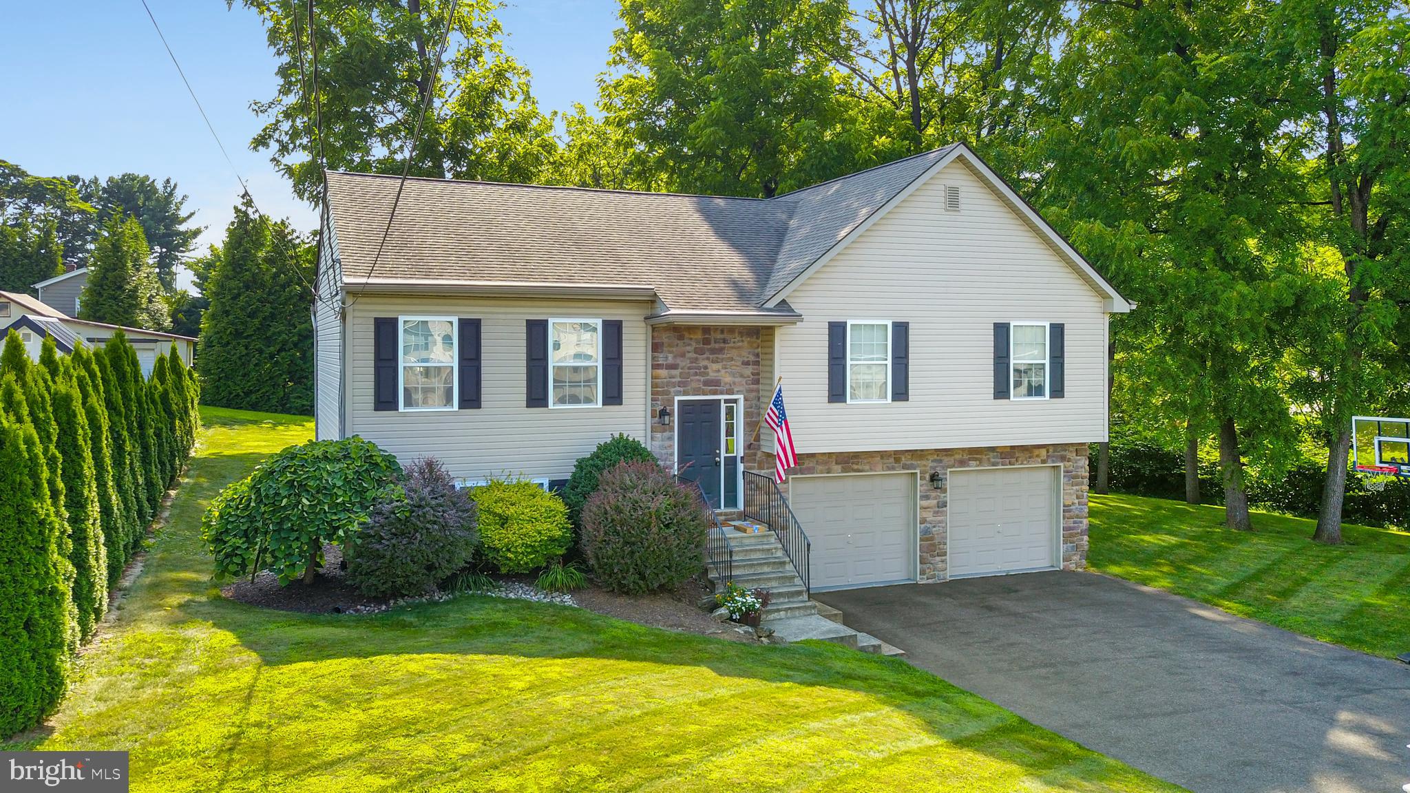 Built in 2011, this open-concept bi-level home offers 4 bedrooms and 2.5 baths, perfectly set on a .30-acre lot at the end of a quiet, low-traffic street in Palmer Township. Designed with comfort and flexibility in mind, the main floor features vaulted 12-foot ceilings, a bright and airy living room, and a maple kitchen with center island—ideal for gatherings and everyday living. The upper level includes three spacious bedrooms and two full baths, including a primary suite. Downstairs, you'll find the fourth bedroom, a generous family room, and a convenient half bath, creating a perfect setup for a guest space, home office, or in-law suite potential with a private entrance. A large laundry area and an oversized two-car garage complete the lower level, offering ample storage and utility space. Enjoy relaxing or entertaining on the private rear deck, and benefit from recent upgrades like a new central AC system and hot water tank. With a modern layout, thoughtful updates, and a quiet cul-de-sac location, this Palmer Township home checks all the boxes for space, comfort, and versatility. Ask how to receive a $3,000 lender credit towards closing costs or lowering your interest rate!
