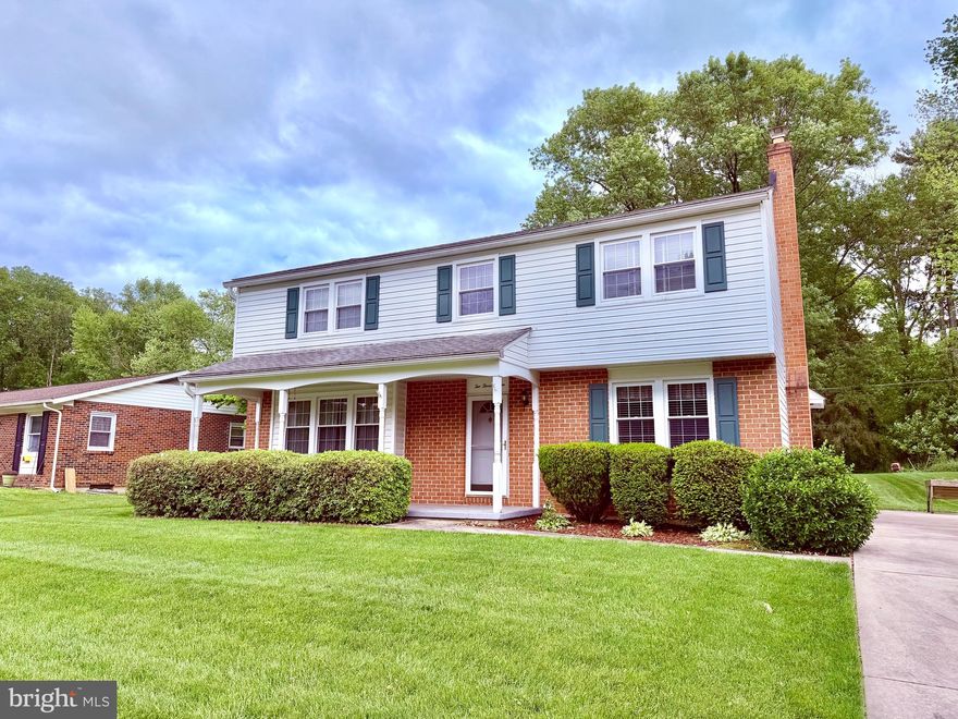 Rare 5-bedroom colonial featuring all 5 bedrooms and 2 full baths on the upper level—an exceptional and hard-to-find layout! The main level offers a formal living room, formal dining room, eat-in kitchen, laundry room, half bath, and a spacious family room with a cozy gas fireplace. Unimproved basement with exterior side entrance and windows provides endless potential. Enjoy gas heat, replacement windows, and a welcoming covered front porch. Located in Forest Hill with generously sized rooms throughout.