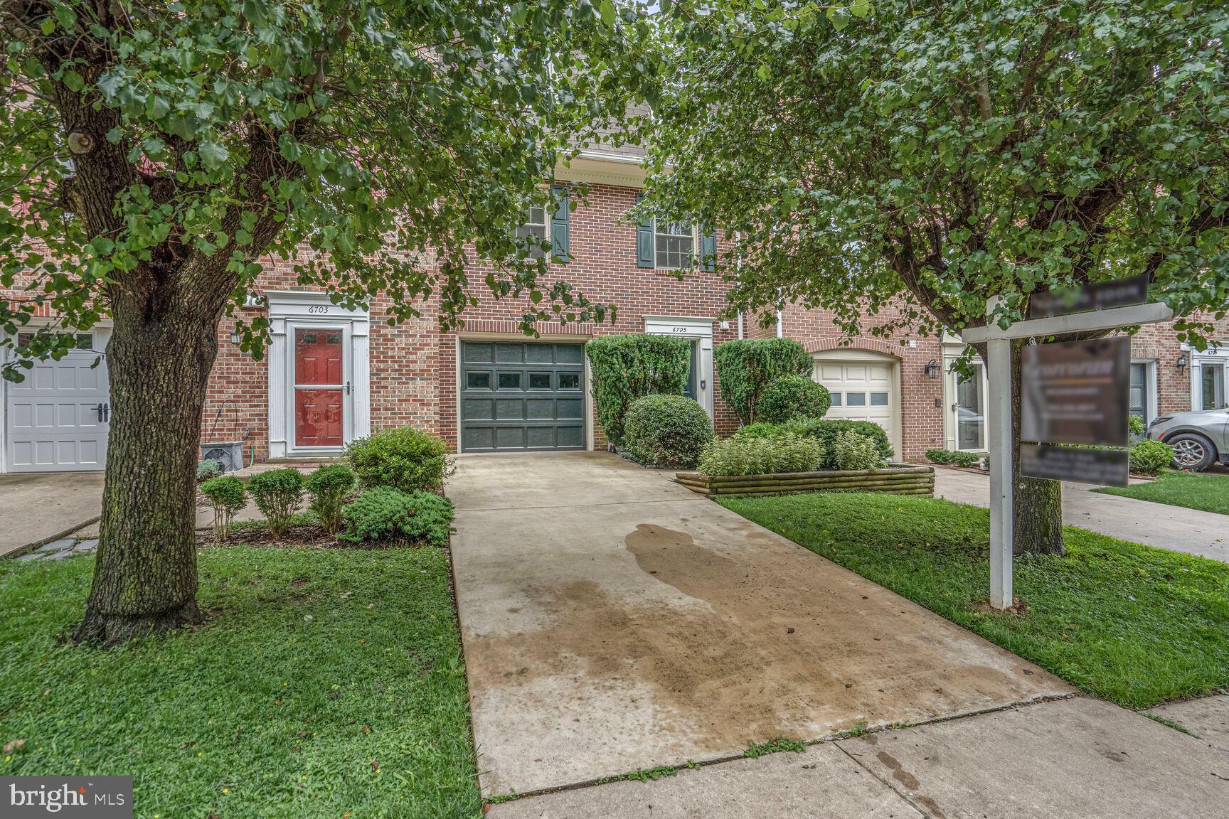 6705 SUNSET WOODS COURT